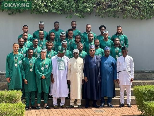 WATCH: Super Eagles return from Cote d’Ivoire; get national award, land gifts from Nigeria government