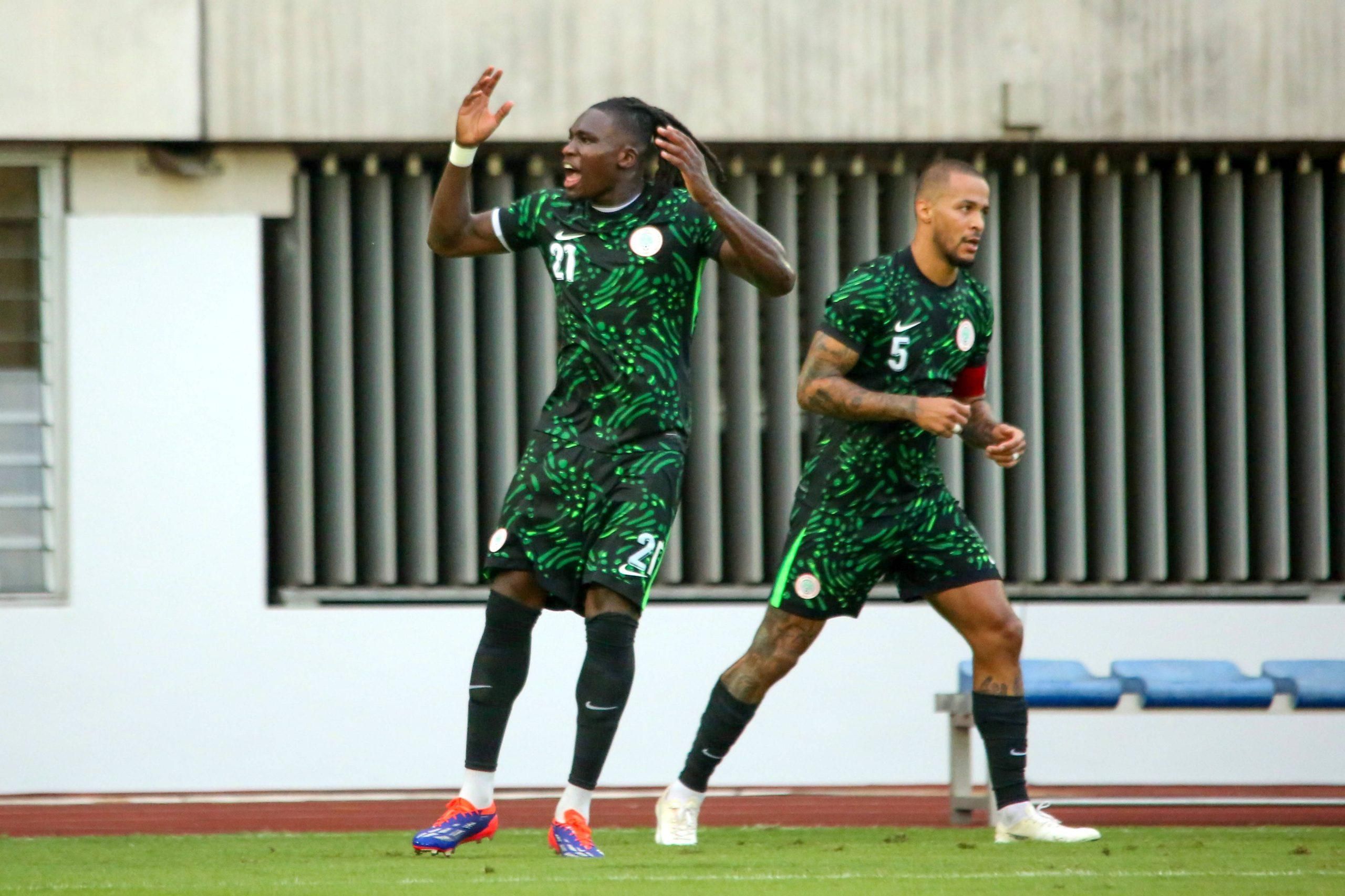 Bassey Calvin Chinedu of Nigeria and William Paul Ekong of Nigeria during the 2025 Africa Cup of Nations AFCON qualifier match between Nigeria and Benin Republic at Godwill Akpabio Stadium