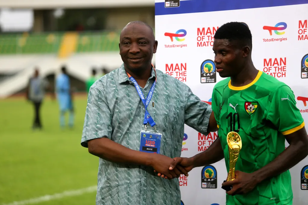 Claude Klidje of Togo and Nff President Ibrahim Musa Gusau during the WAFU B-U-20 Championship