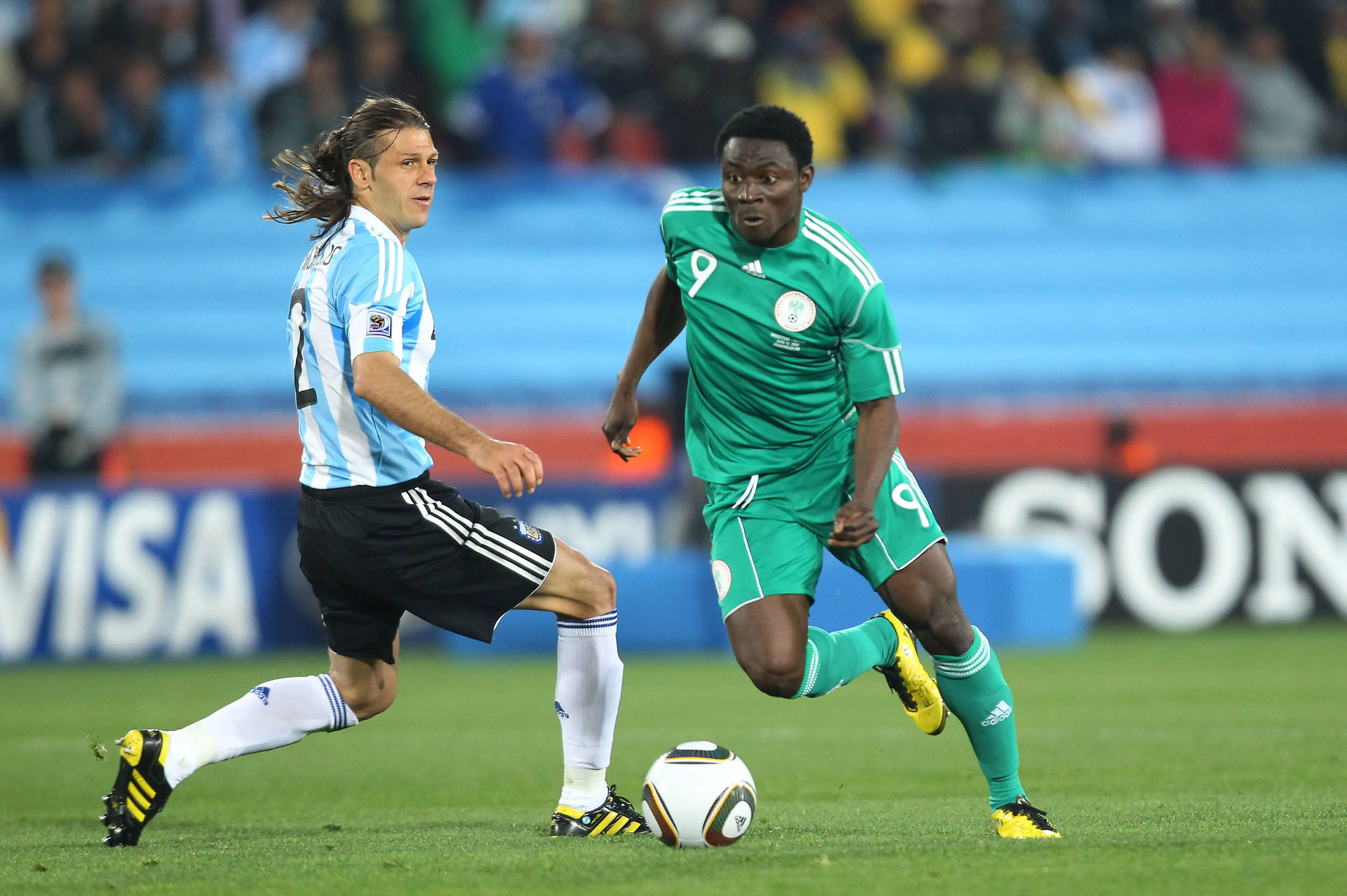 Obafemi Martins goes past Martin Demichelis