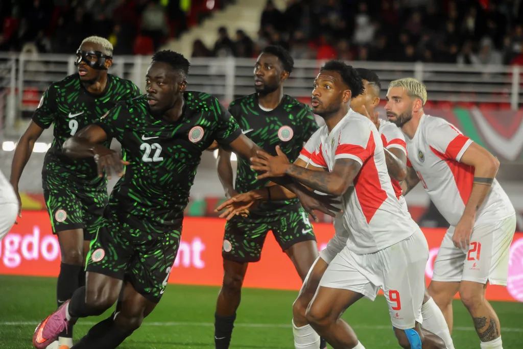 Faizal Abdul A Bangal, Renildo Isnard Mandava and Ricardo Martins Guimaraes of Mozambique and Wilfred Ndidi, Victor Osimhen and Akor Adams of Nigeria during AFCON 2025 match between Super Eagles and Mozambique