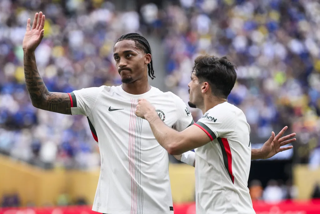 Joao Pedro reacts with Pedro Neto of after scoring a goal during the FIFA Club World Cup semi final football match between Fluminense FC and Chelsea FC. East Rutherford, United States