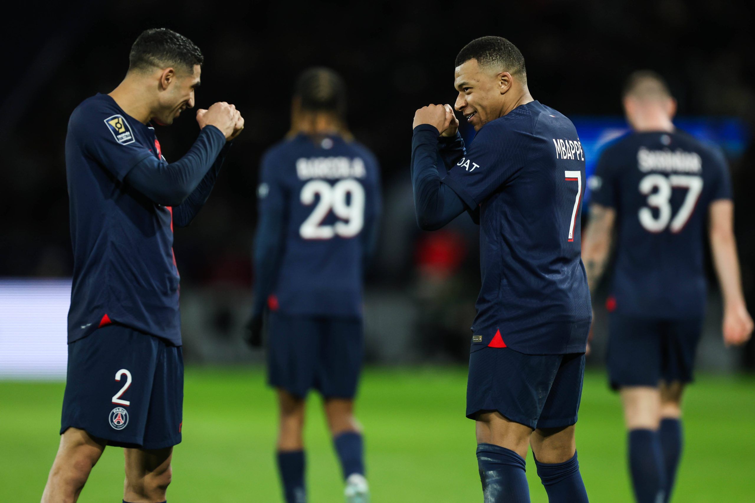 Kylian Mbappe celebrating his goal with Achraf Hakimi