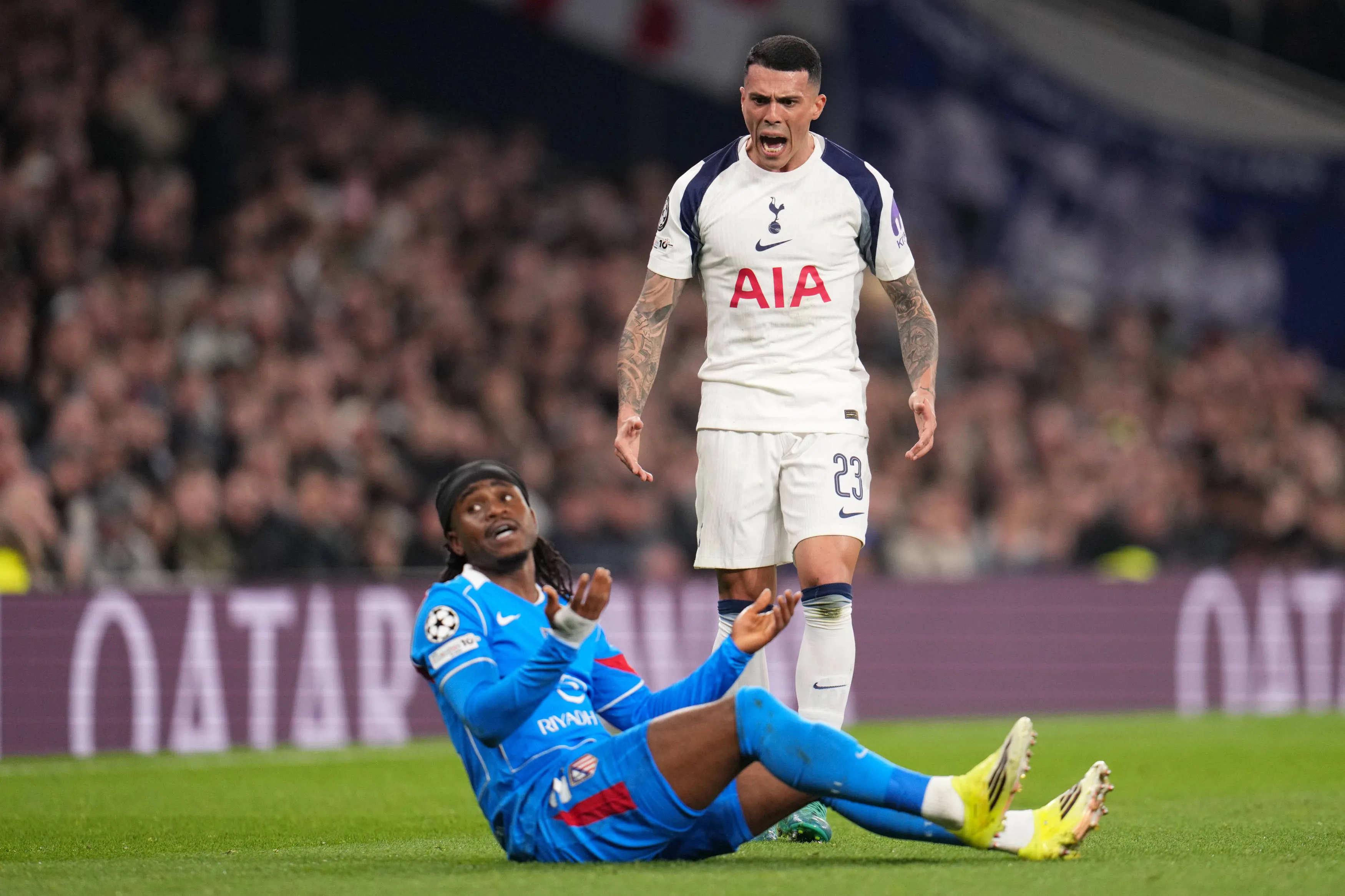  Pedro Porro of Tottenham Hotspur shouts furiously at Ademola Lookman of Atletico Madrid
