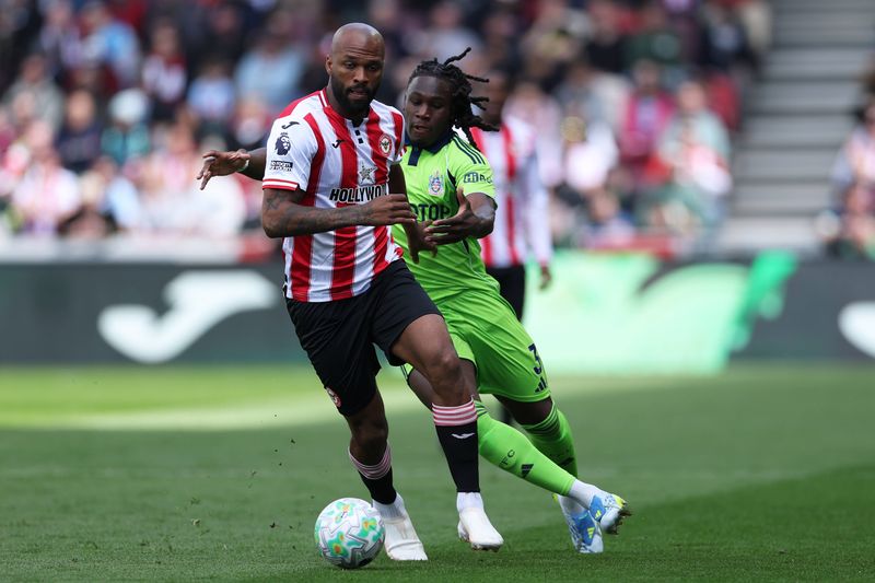 Igor Thiago of Brentford in action with Calvin Bassey of Fulham during the Premier League match between Brentford and Fulham at the Gtech Community Stadium in Brentford, United Kingdom, on April 18, 2026. Brentford Greater London United Kingdom.