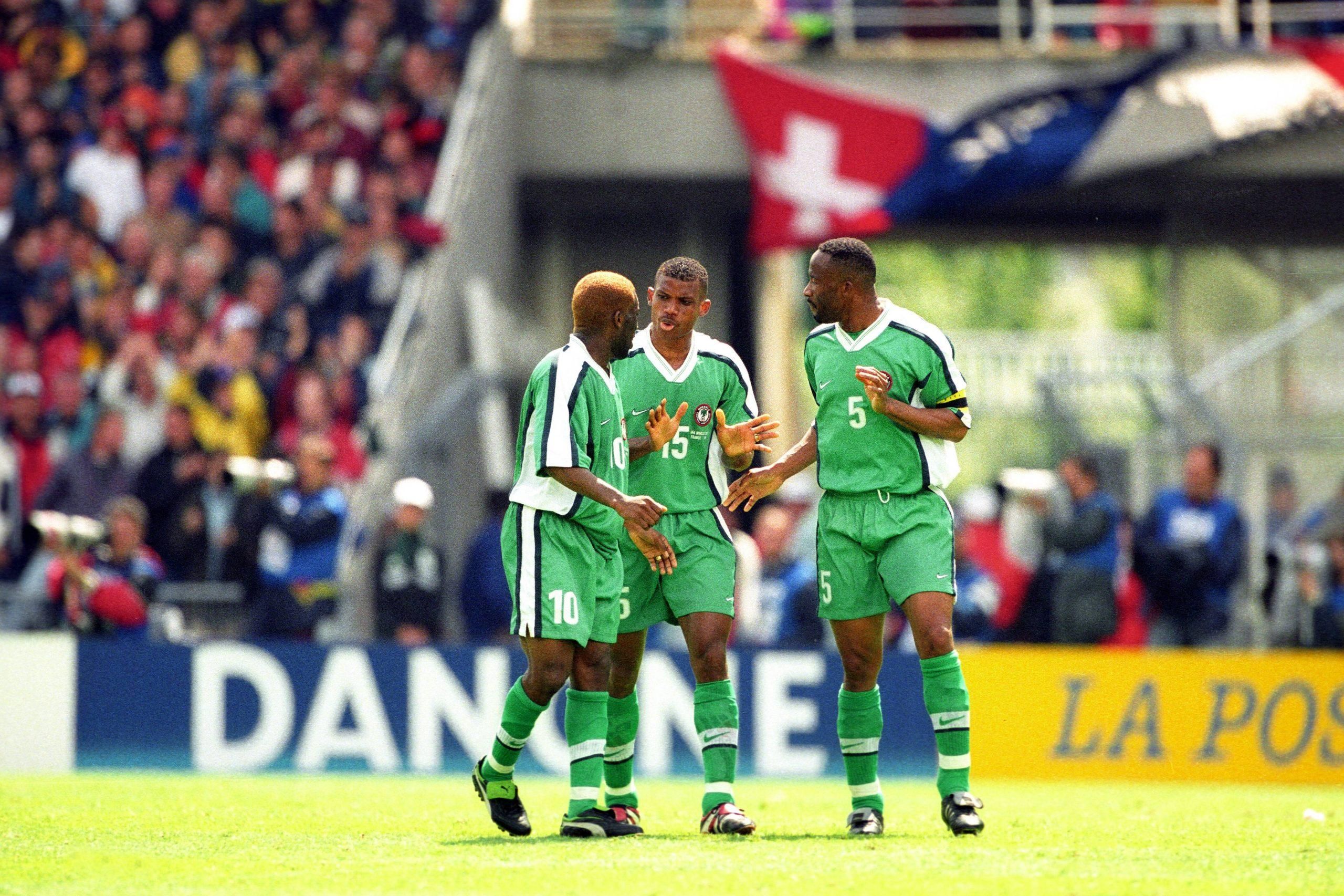 Super Eagles of Nigeria players discussing 