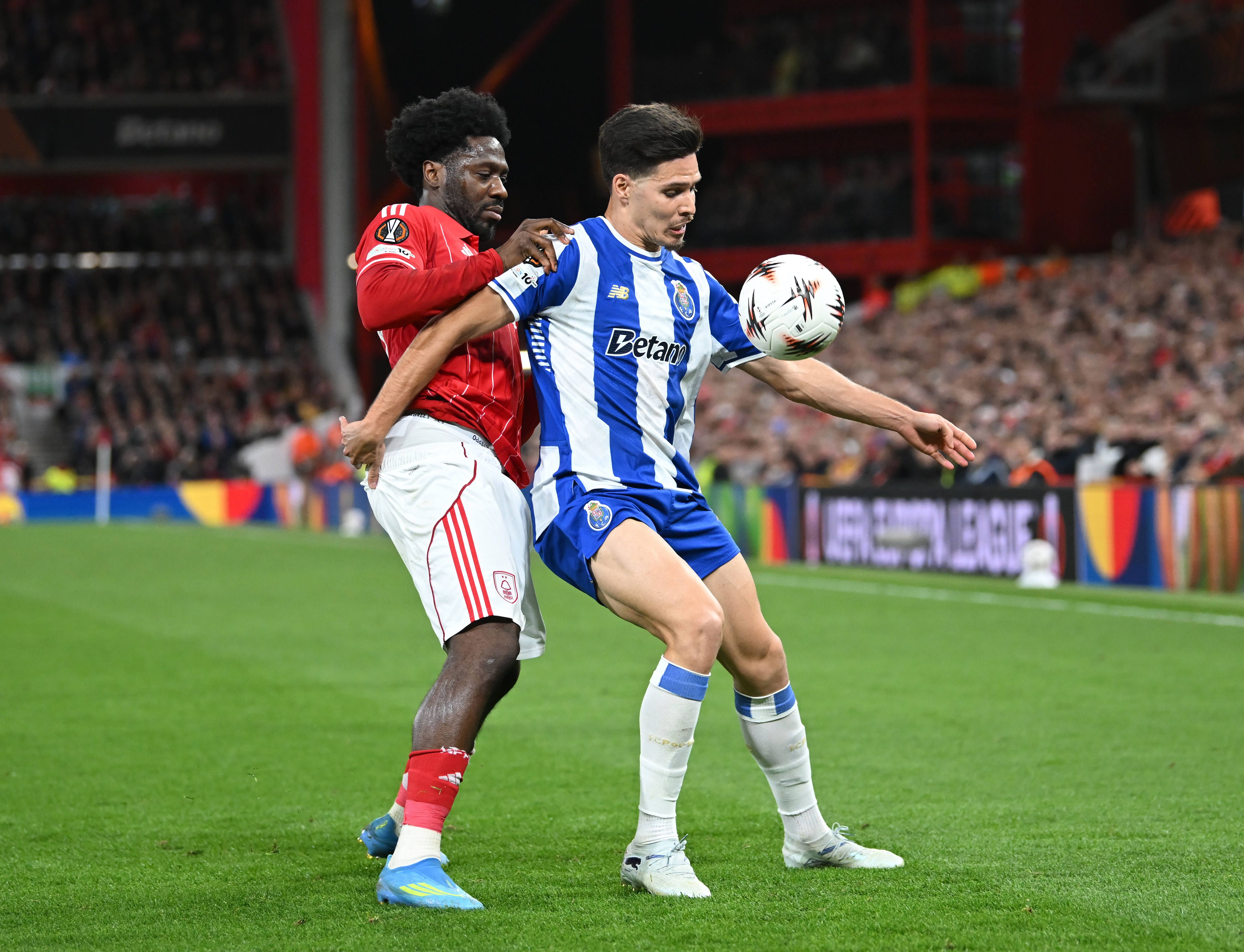 Ola Aina holds up Francisco Moura during Nottingham Forest vs FC Porto clash
