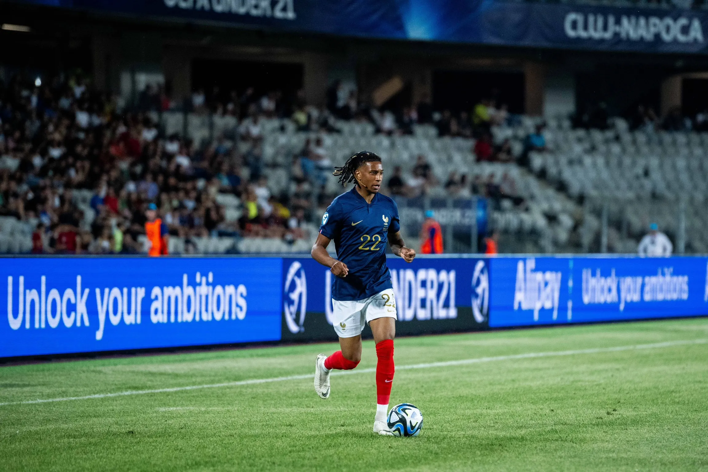 Michael Olise in action for France