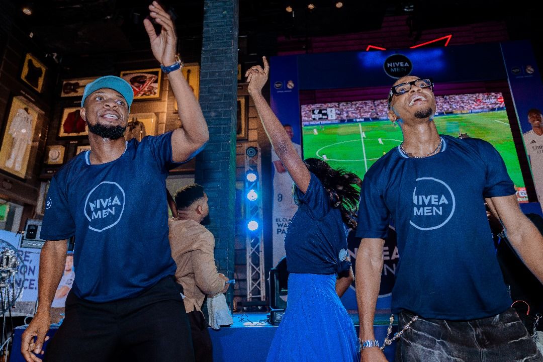 MC Lively and Groovy cheer the Nigerian fans during watch party