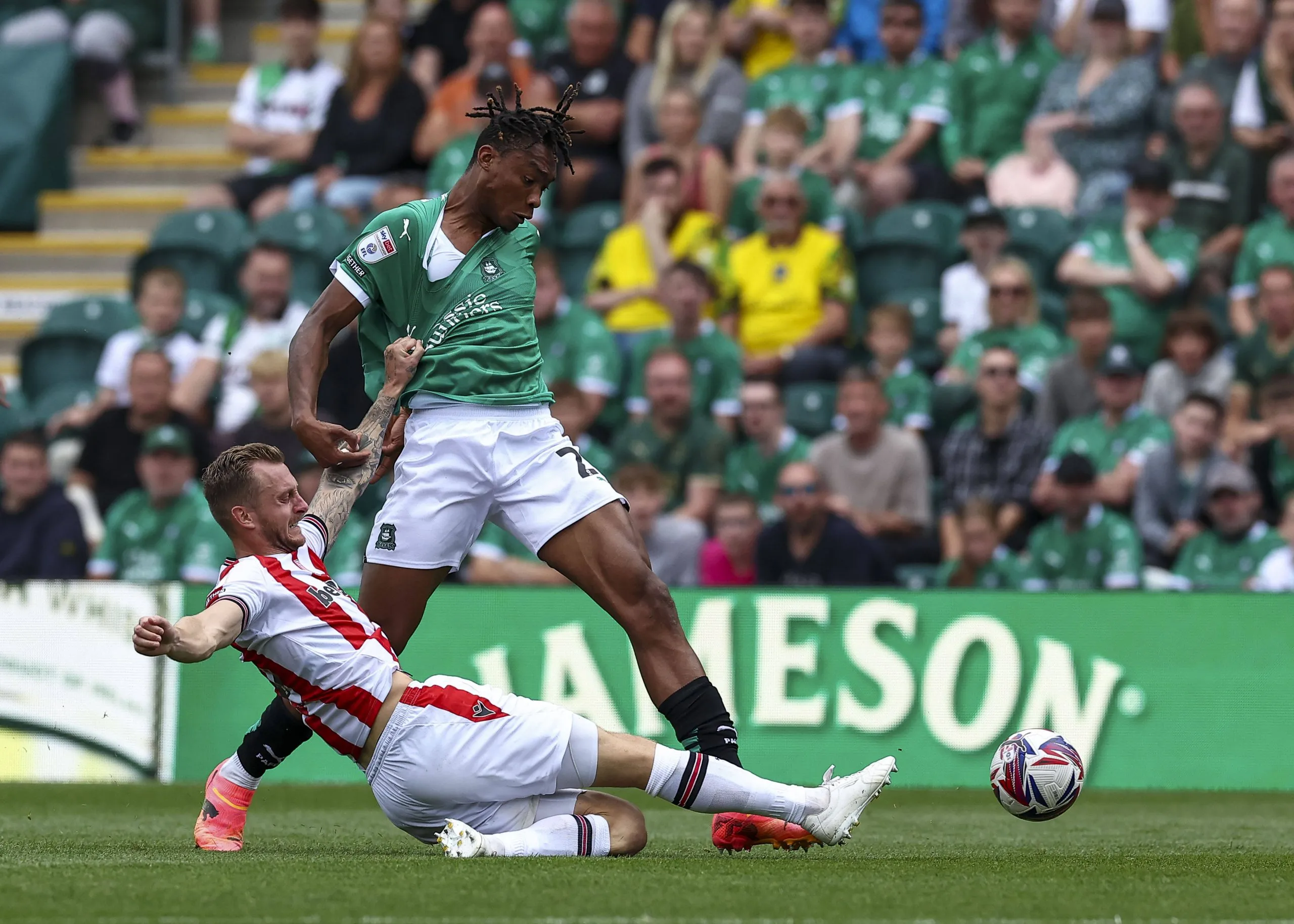Muhamed Tijani in action for Wayne Rooney's Plymouth