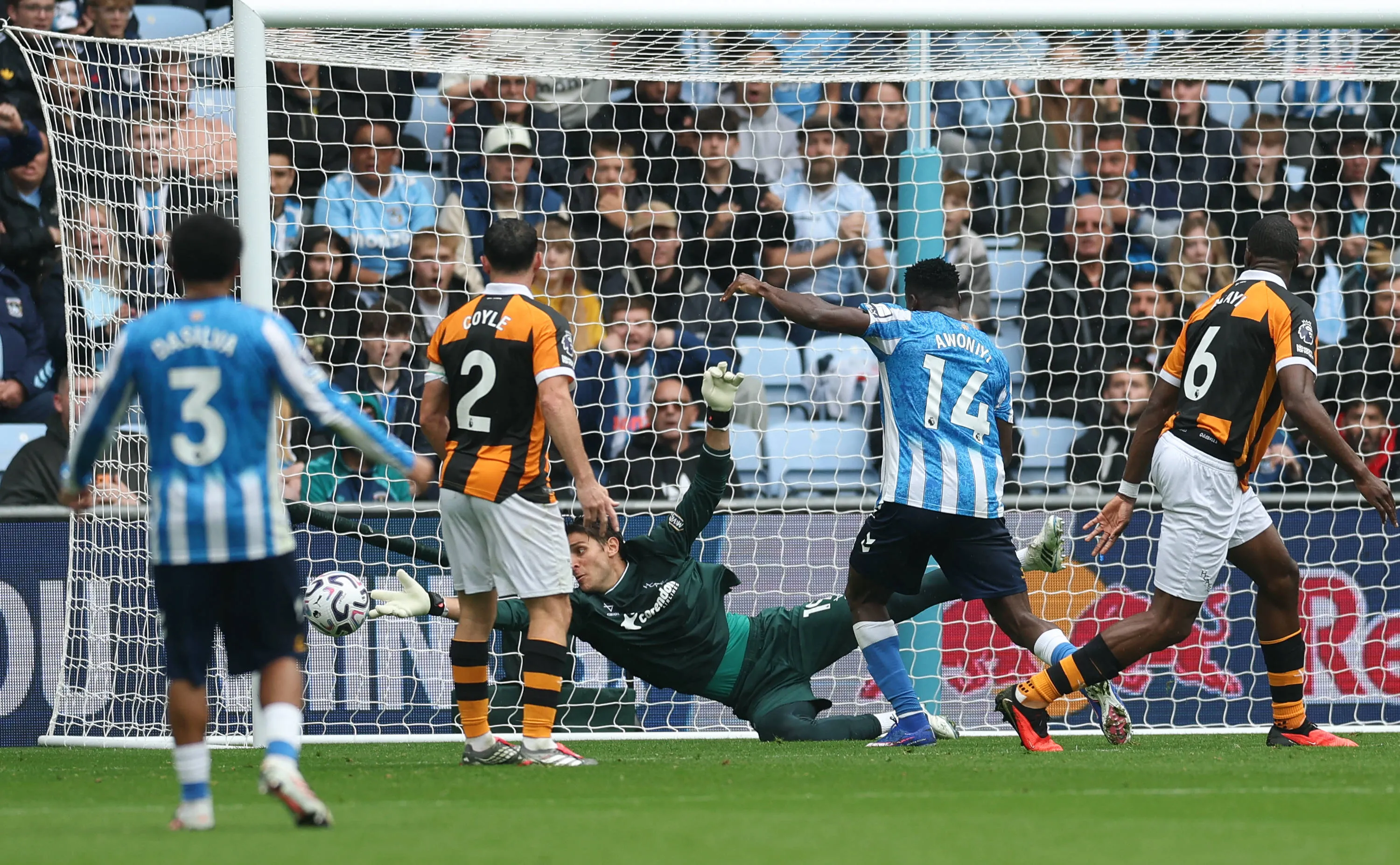 Konstantinos Tzolakis makes a crucial save to deny Taiwo Awoniyi