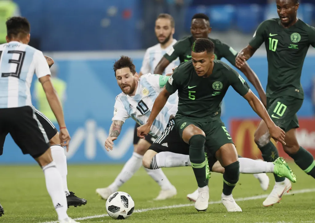 William Troost-Ekong battling with Lionel Messi for the ball: Nigeria vs Argentina, 2018 FIFA World Cup
