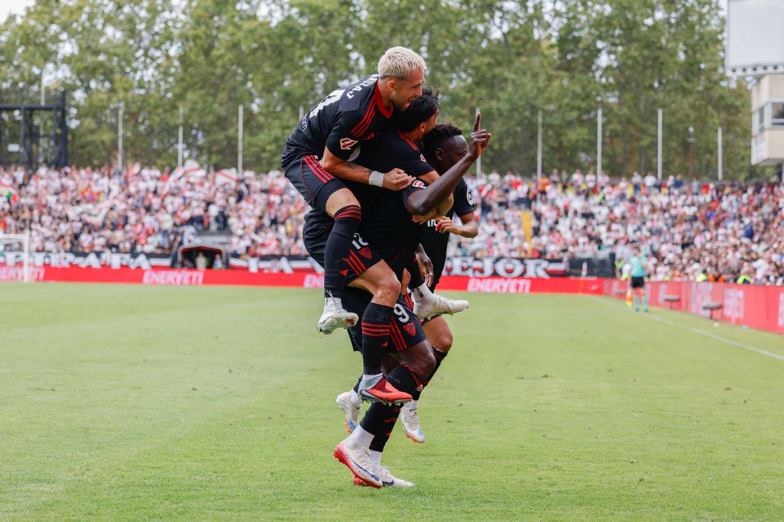 Akor Adams and Sevilla teammates celebrating goal