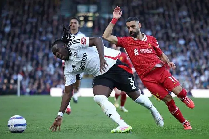 Nigeria’s Calvin Bassey and Liverpool's Mo Salah
