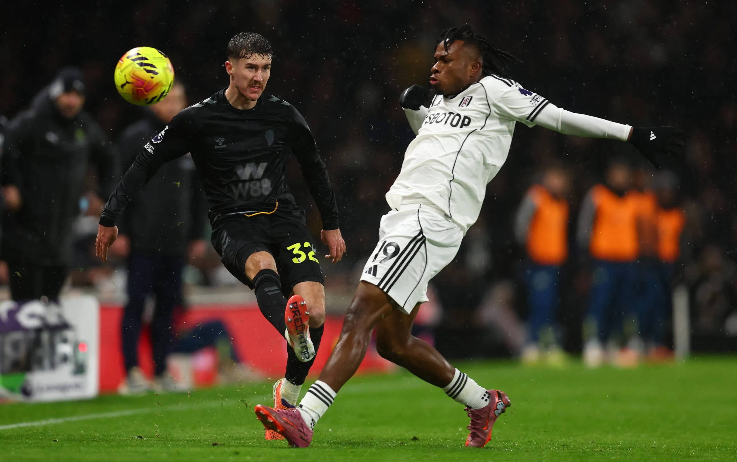 Trai Hume and Samuel Chukwueze challenge for the ball during the Fulham vs Sunderland Premier League match at Craven Cottage
