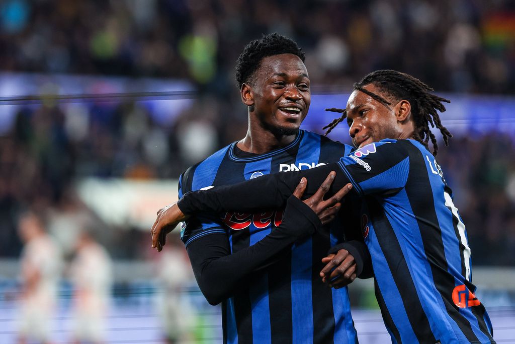 Ibrahim Sulemana celebrates after scoring a goal with Ademola Lookman of Atalanta BC during Serie A 2024/25 football match between Atalanta BC and AS Roma at Gewiss Stadium