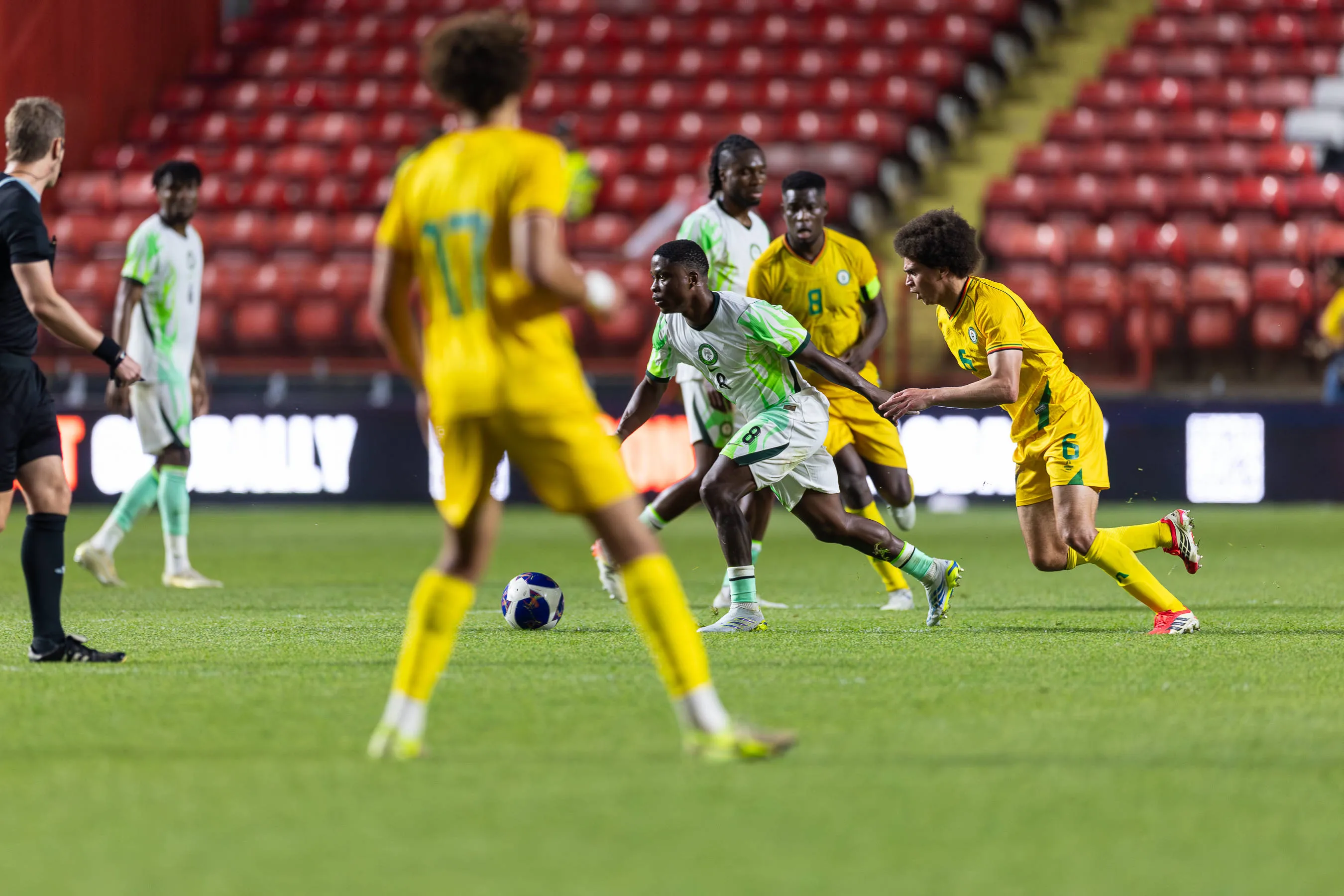 Super Eagles midfielder Tochukwu Nnadi and Zimbabwe midfielder Jonah Fabisch