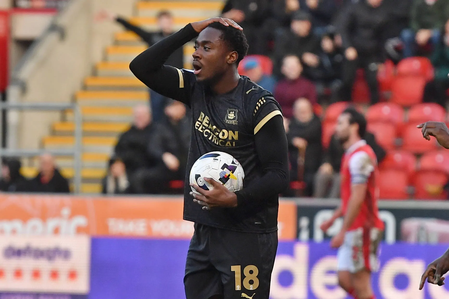 Plymouth Argyle forward Owen Oseni in despair at goal flagged offside