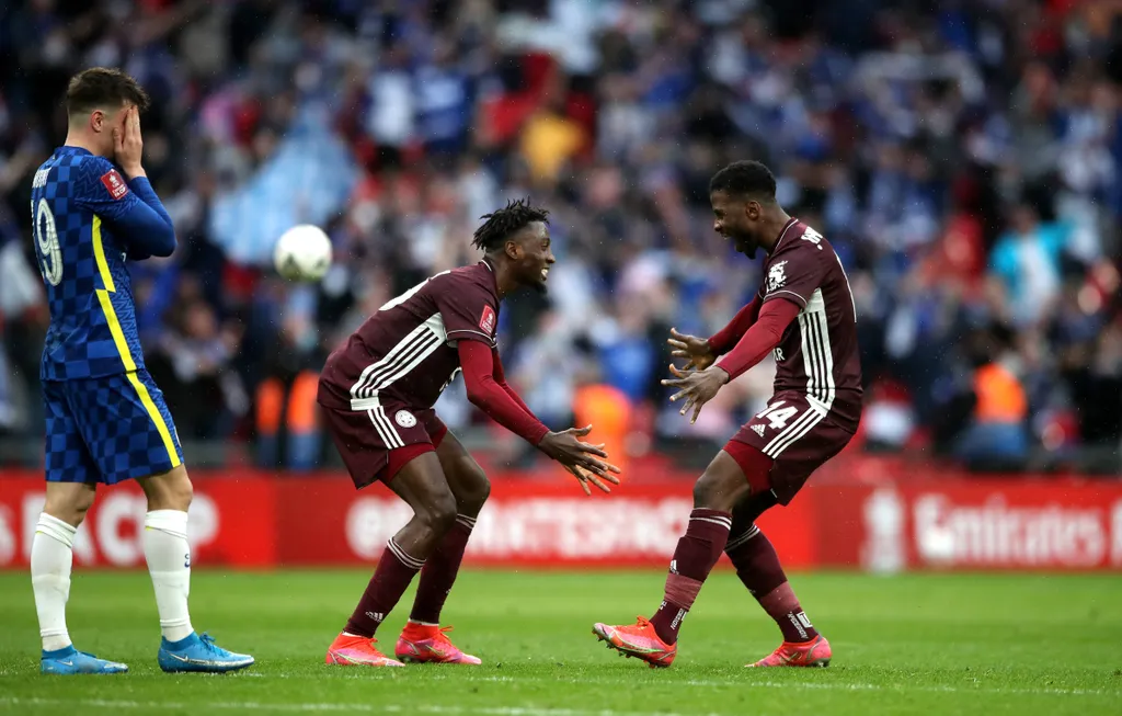 Wilfred Ndidi and Kelechi Iheanacho celebrate after the Emirates FA Cup Final at Wembley Stadium, London