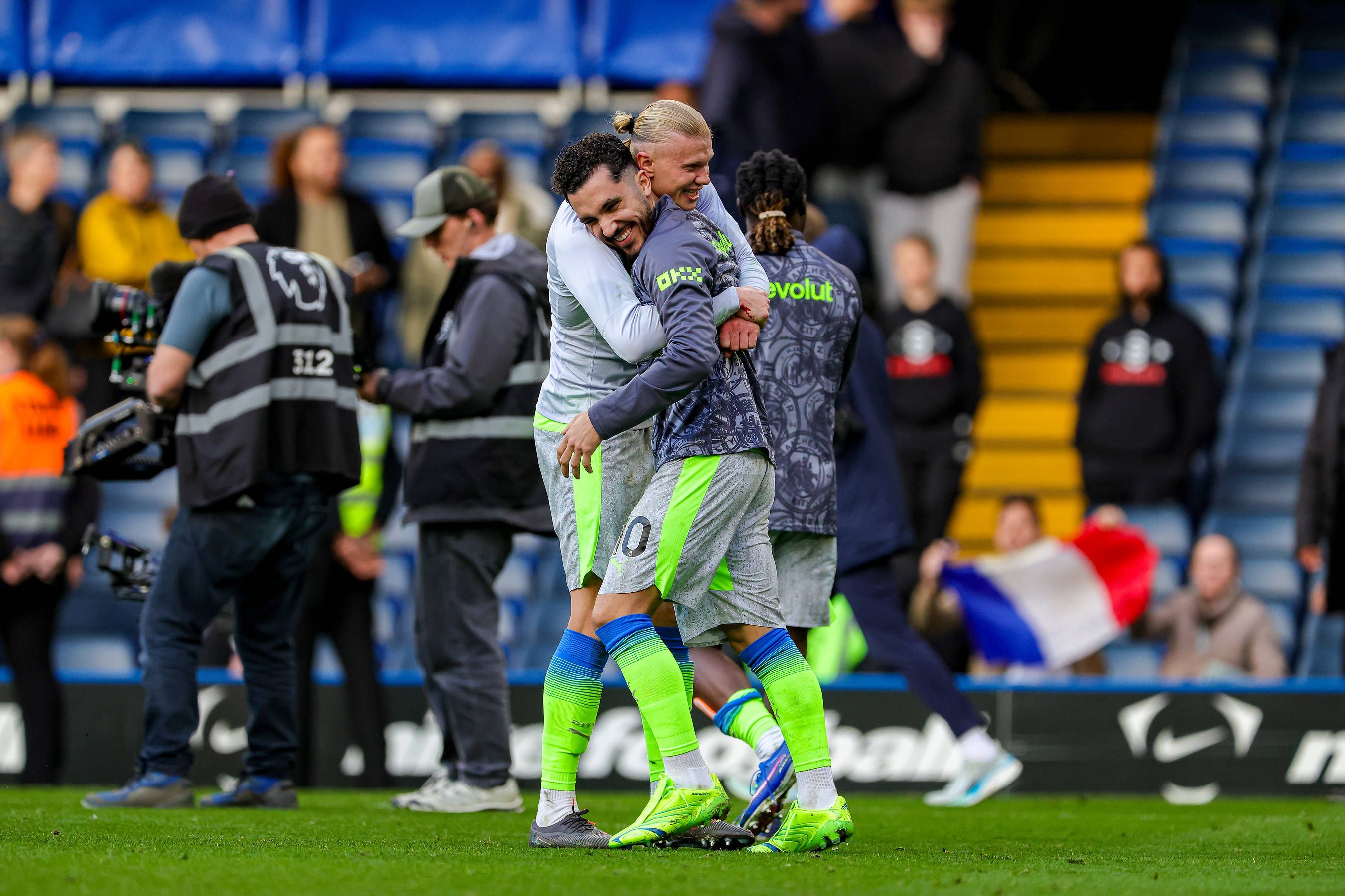 Erling Haaland and Rayan Cherki of Manchester City celebrate at full time