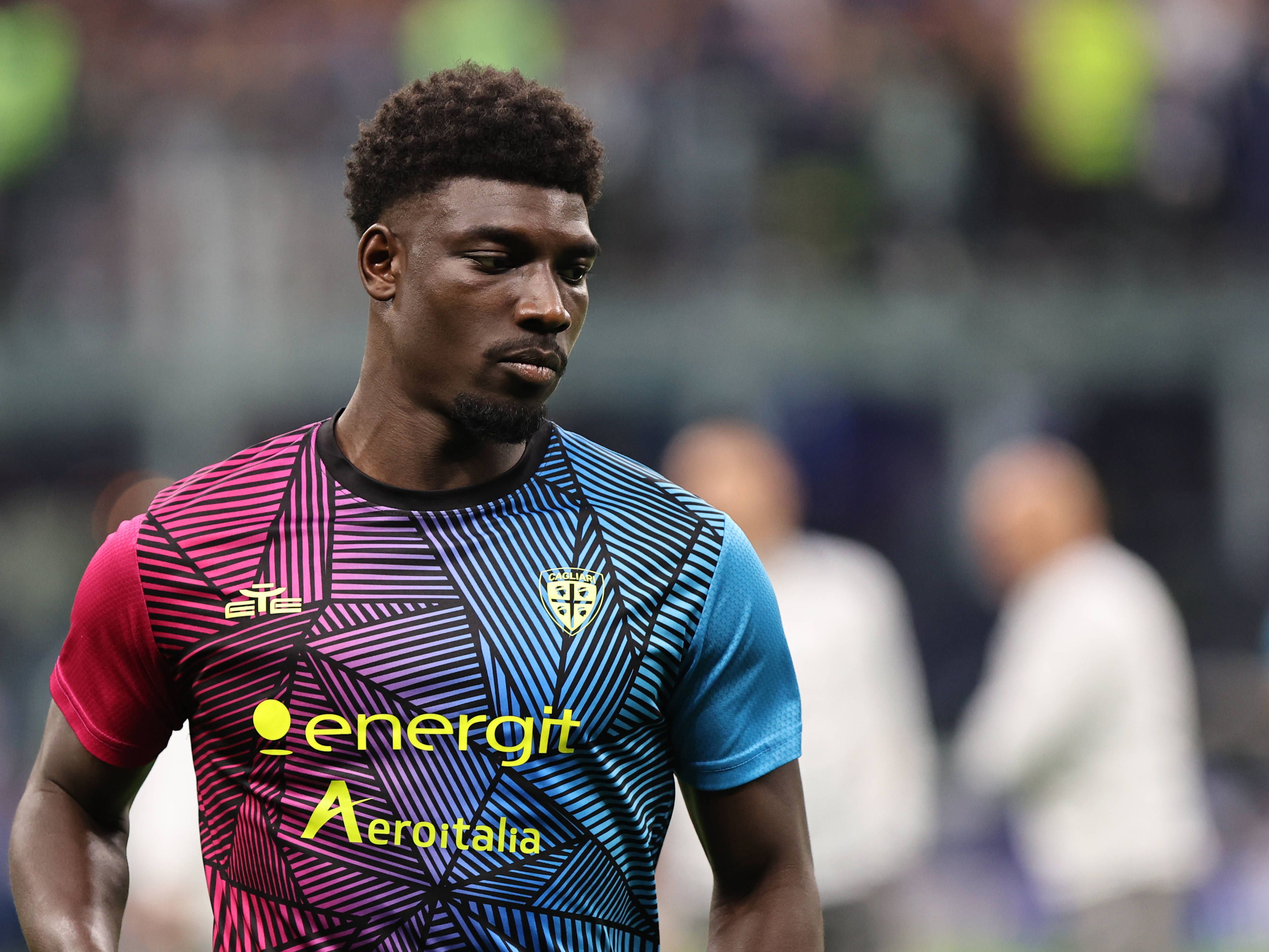 Michel Adopo participates in the match between Inter and Cagliari