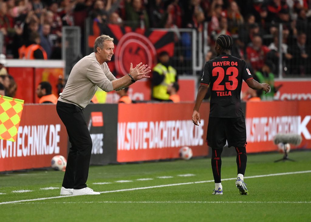 Trainer Kasper Hjulmand and Nathan Tella Bayer 04 Leverkusen
