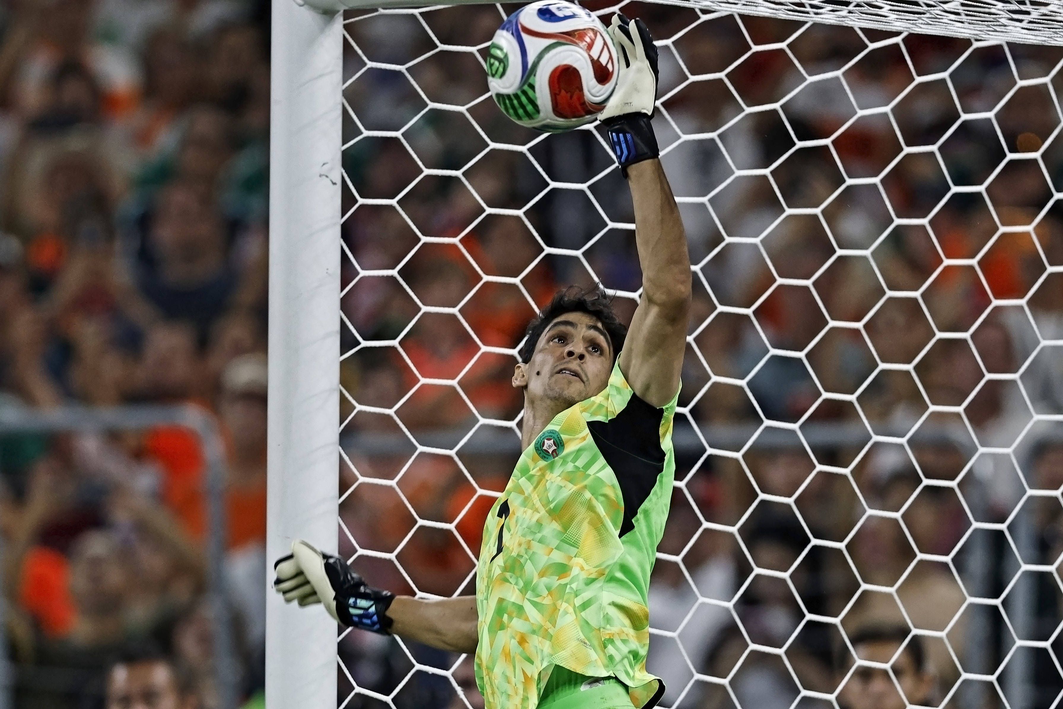 Yassine Bounou of Morocco saves the Netherlands fifth penalty taken by Crysencio Summerville at the 2026 FIFA World Cup