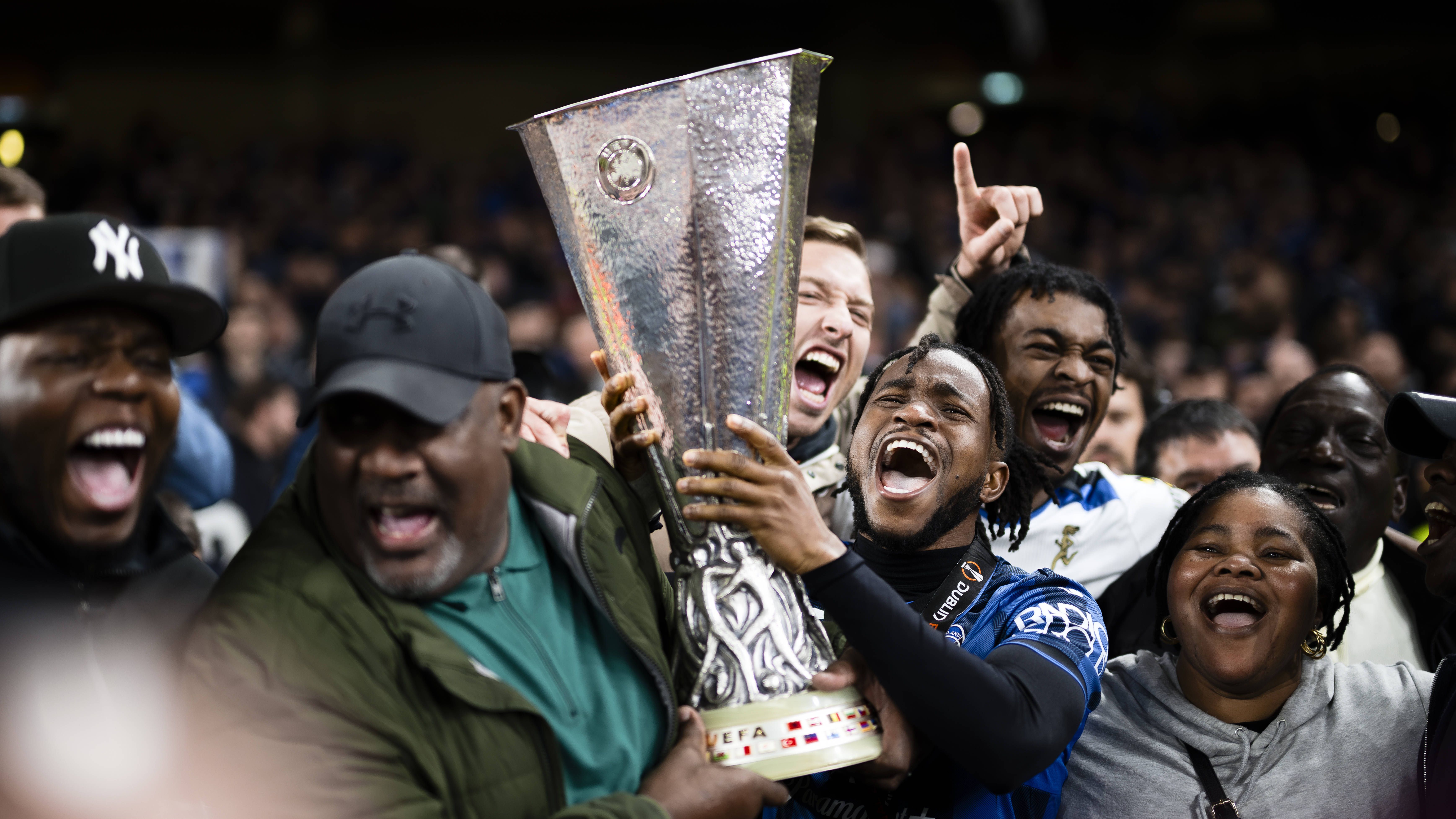 Ademola Lookman of Atalanta BC celebrates with the trophy during the award ceremony following the UEFA Europa League final football match between Atalanta BC and Bayer 04 Leverkusen