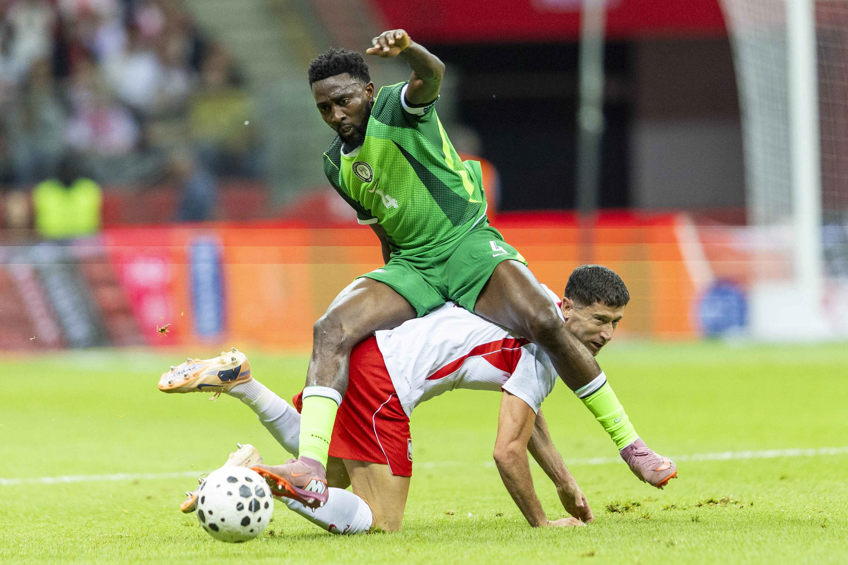 Super Eagles midfielder Wilfred Ndidi get the better of Poland legend Robert Lewandowski