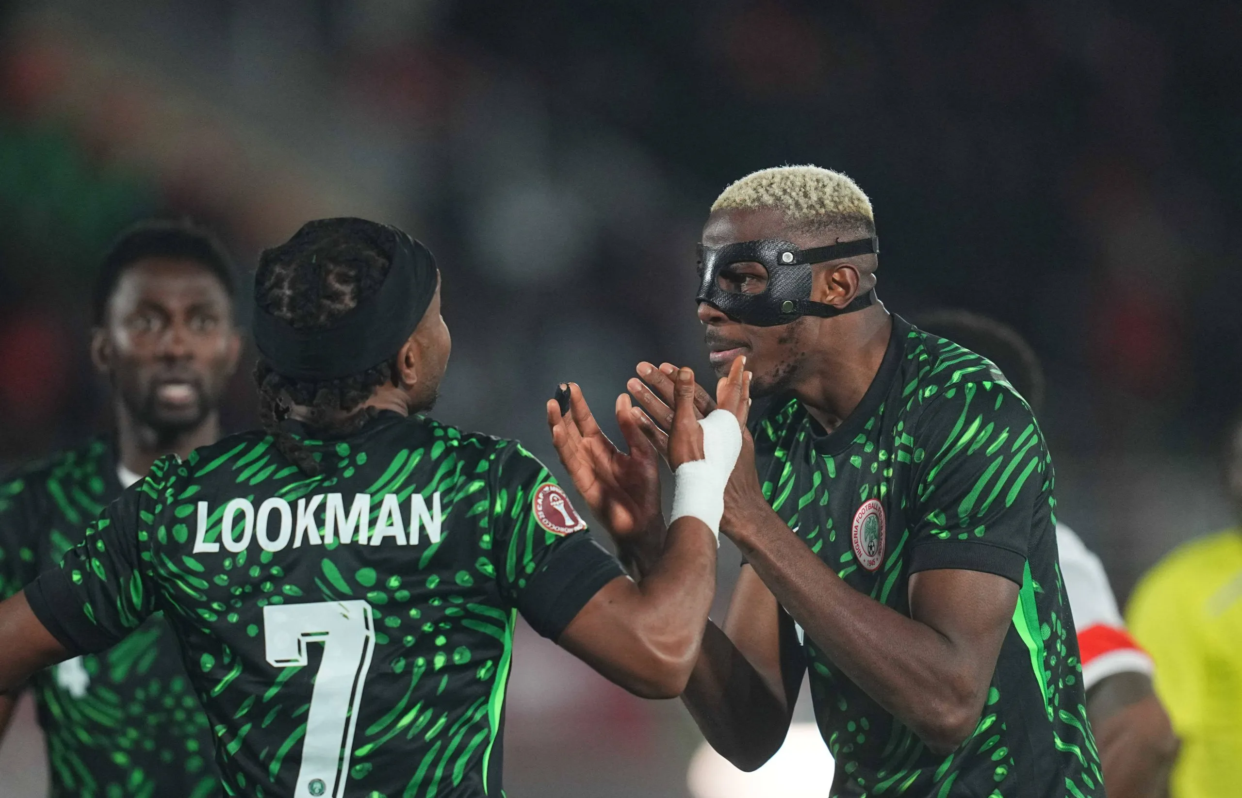 Victor James Osimhen and Ademola Olajade Lookman gestures during the Africa Cup Of Nations match between Mozambique and Nigeria
