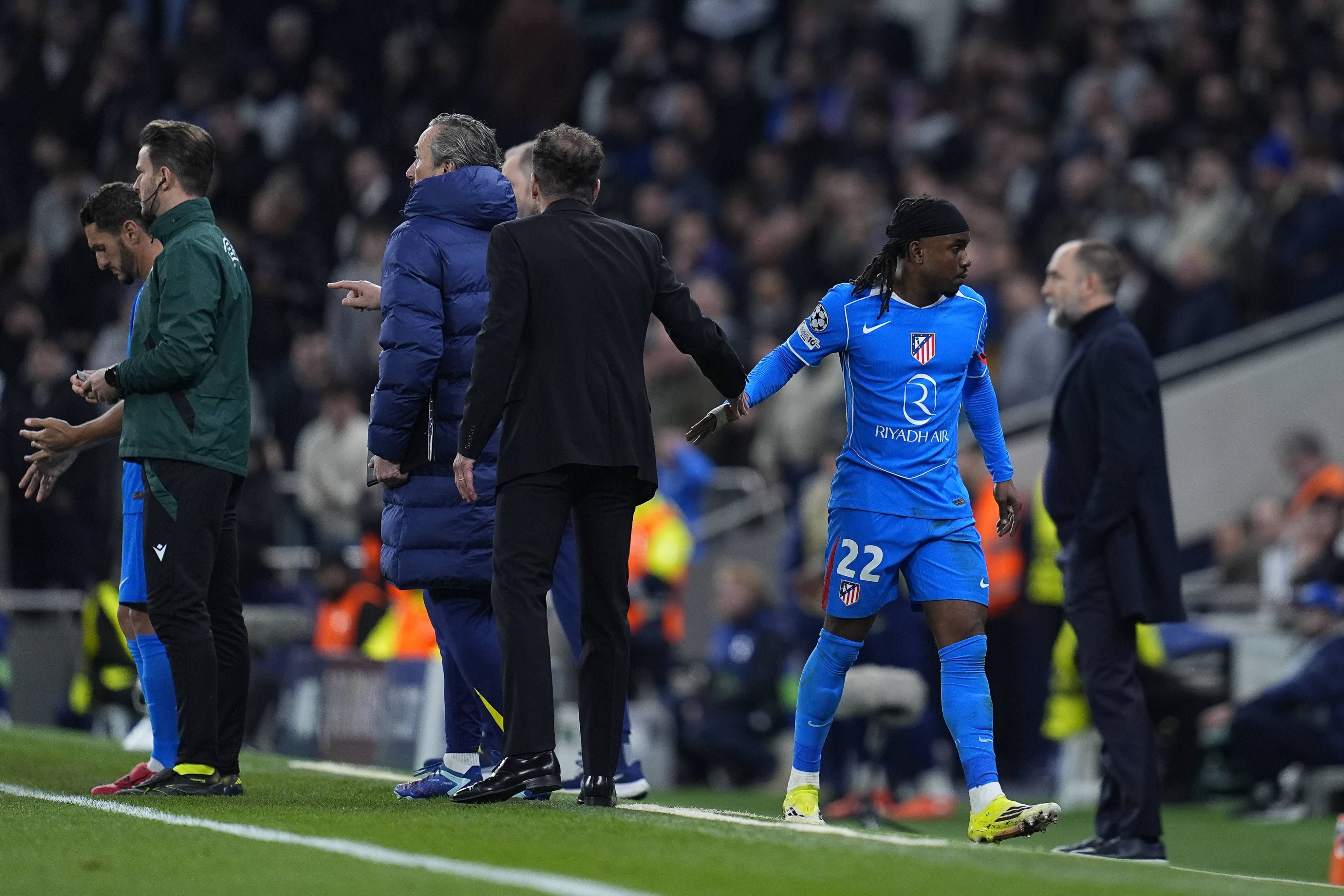 Diego Simeone, head coach of Atletico de Madrid, greets Ademola Lookman