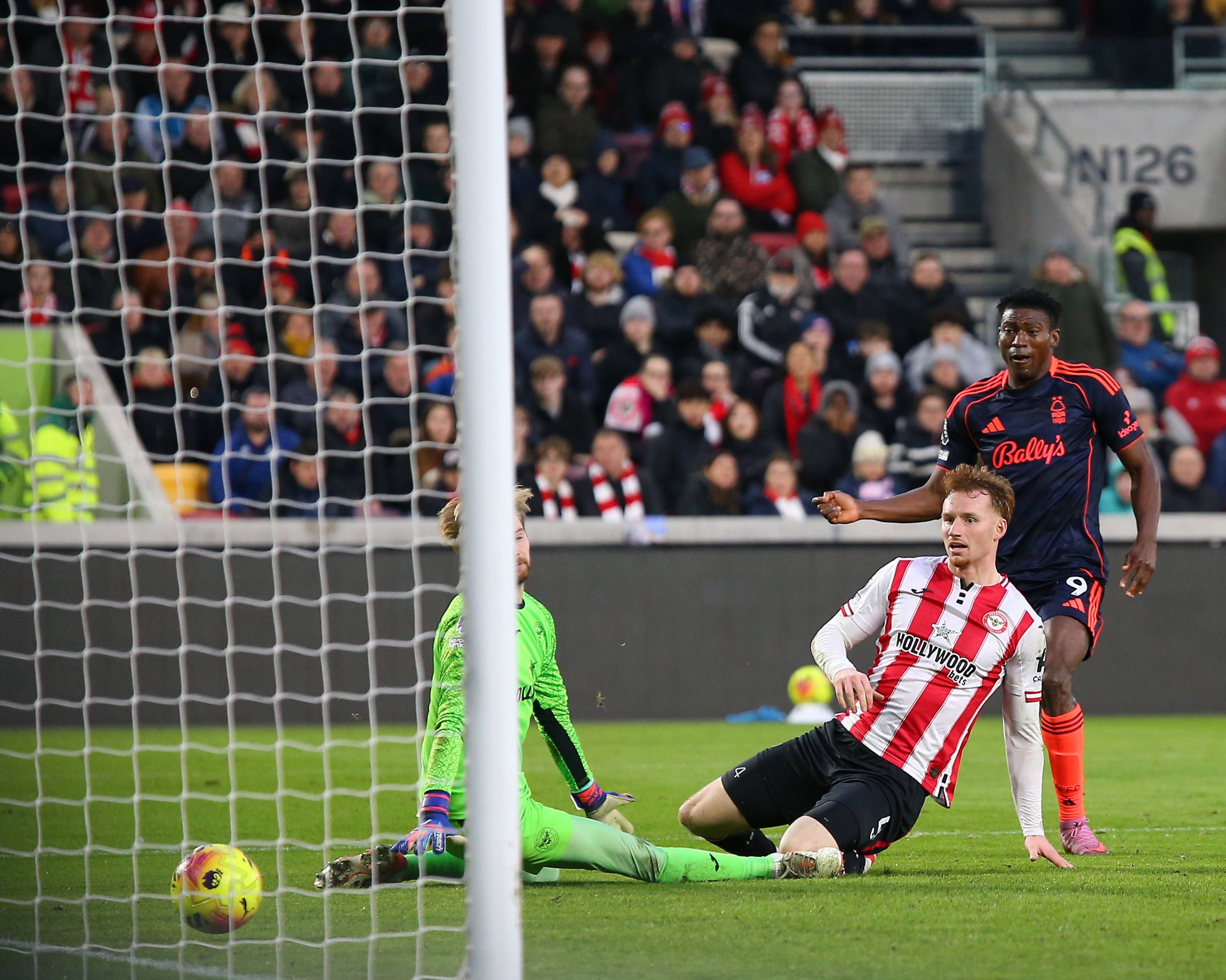 Taiwo Awoniyi slots ball past Caoimhin Kelleher
