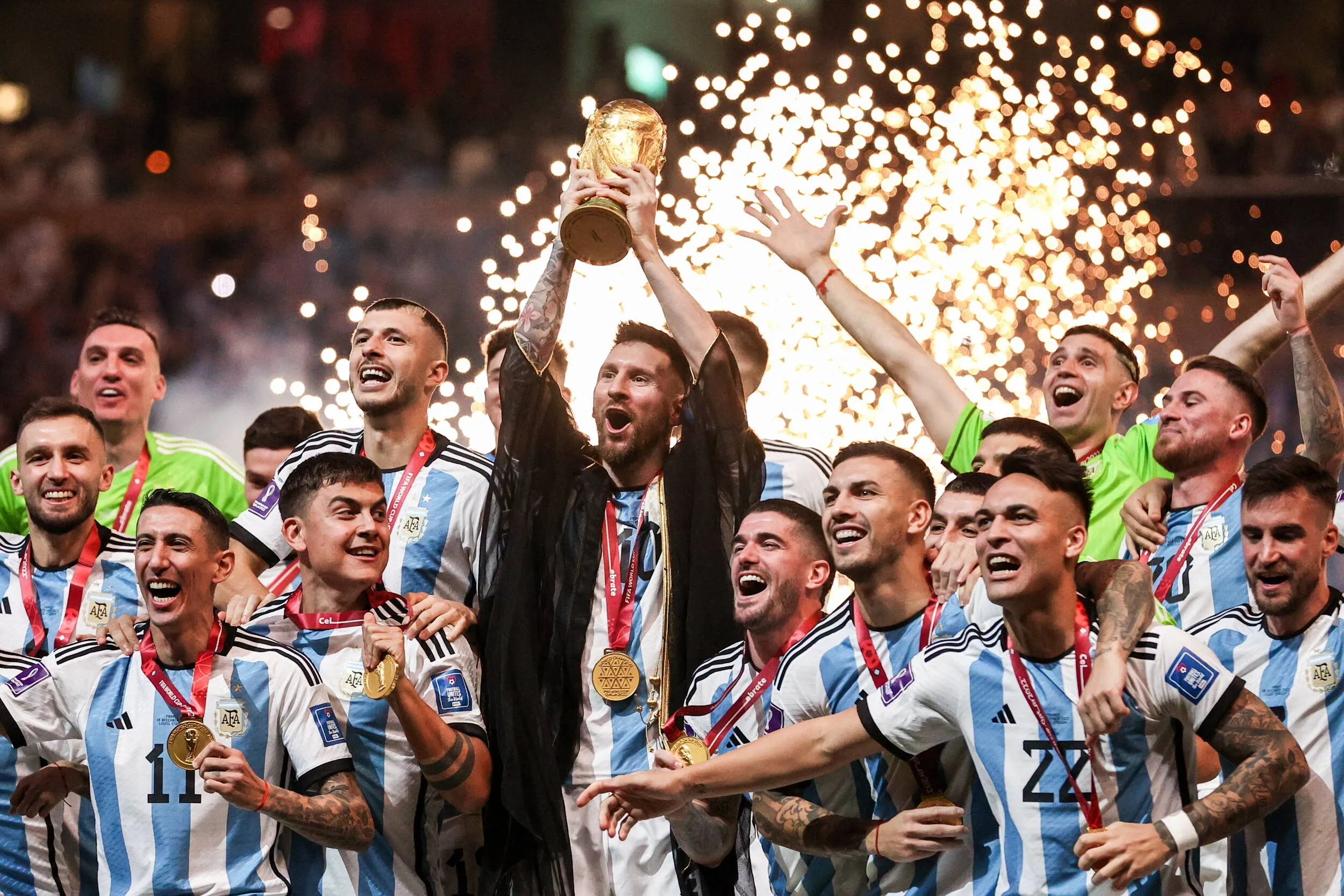 Argentina celebrate during the trophy ceremony for the 2022 final match between Argentina and France