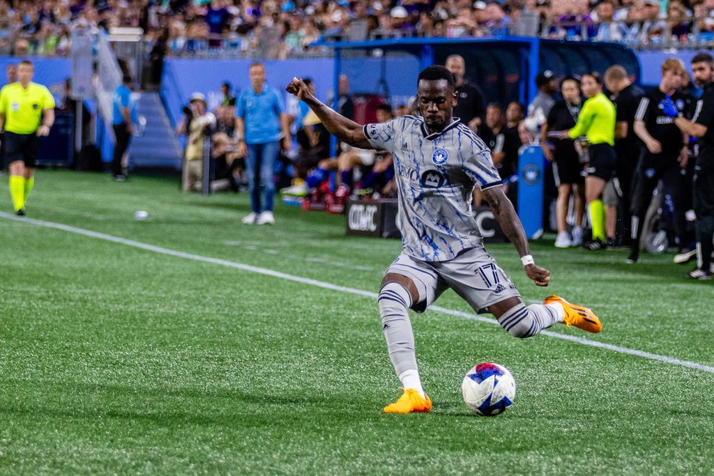 Jojea Kwizera 17 looks to center the ball against the Charlotte FC in the Major League Soccer match-up at Bank of America Stadium in Charlott