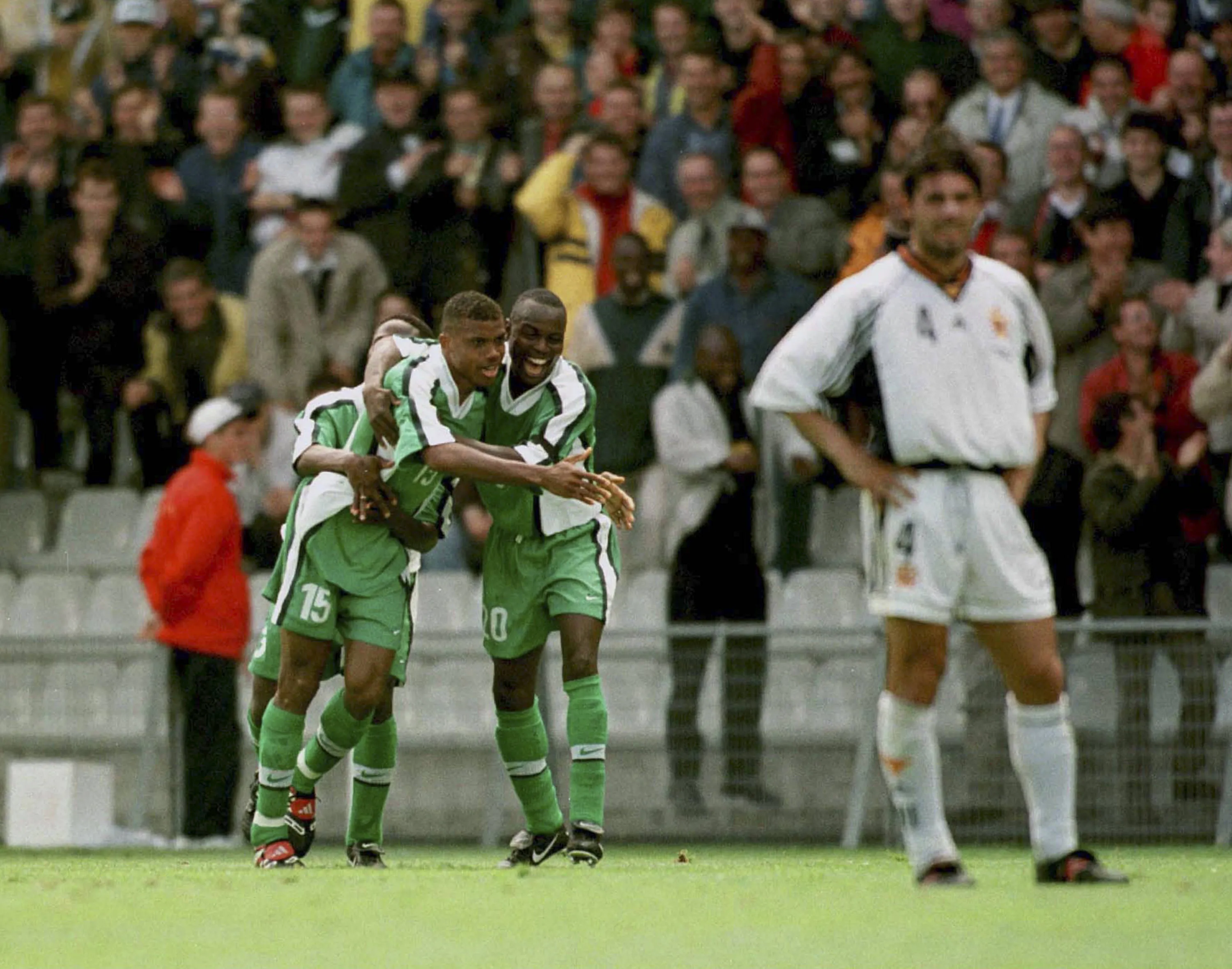 Sunday Oliseh and Victor Ikpeba of Nigeria celebrate during the FIFA World Cup Finals 1998 Group D match against Spain