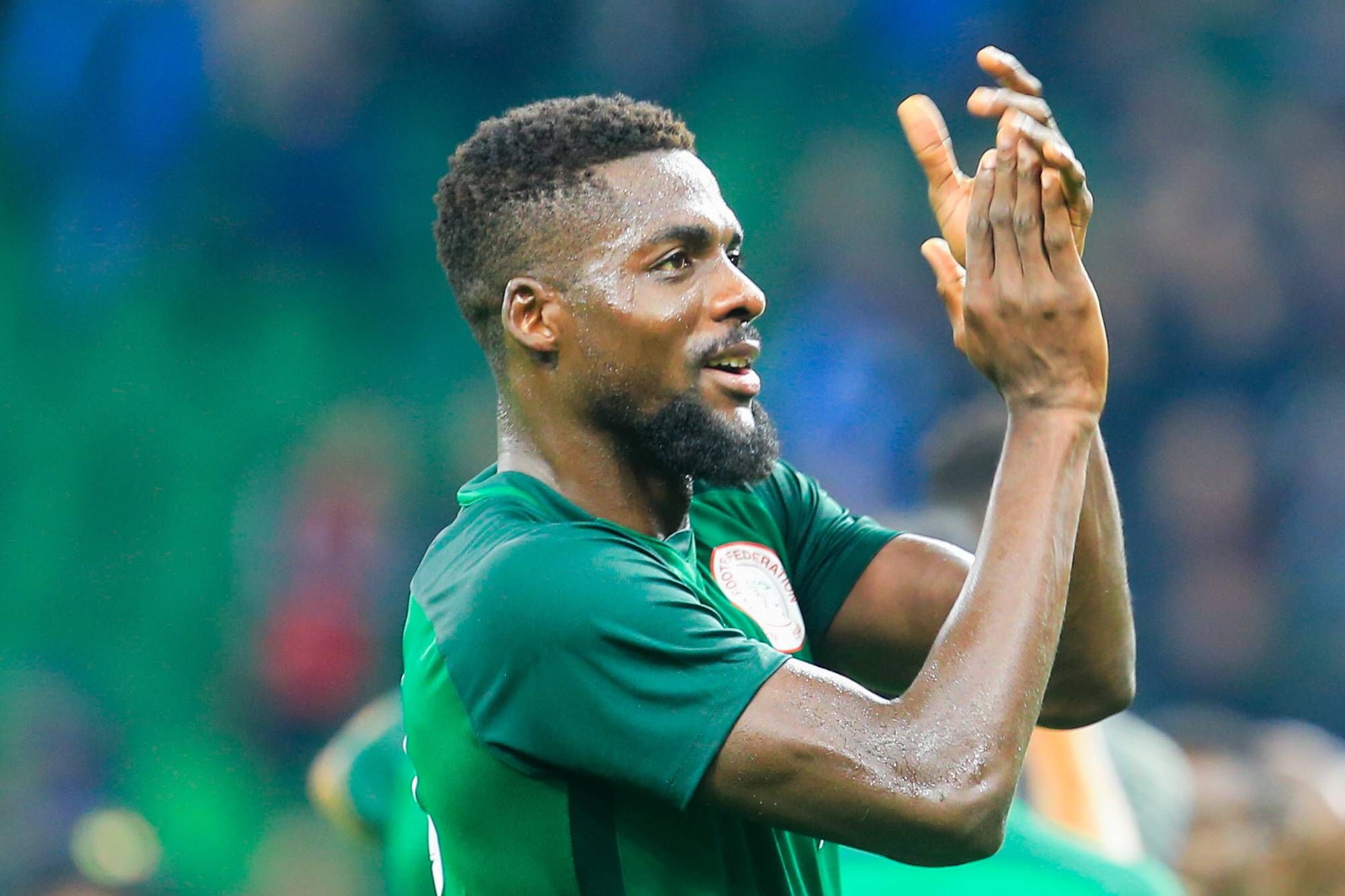 Nigeria's John Ogu celebrates his team's victory in an International Friendly match against Argentina