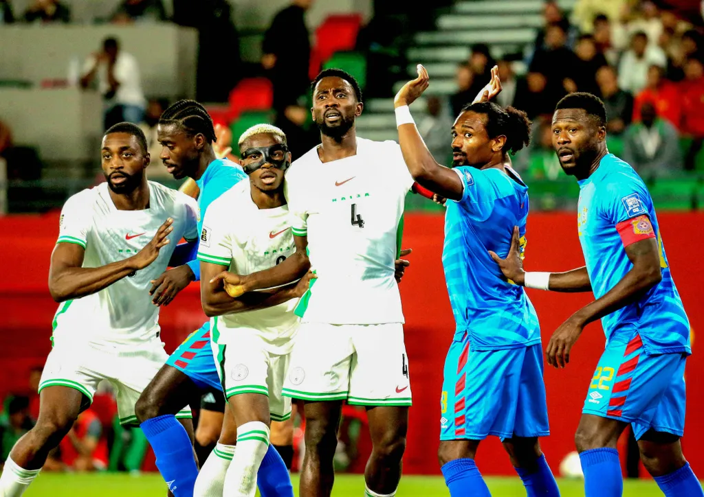 Semi Ajayi, Victor Osimhen and Wilfred Ndidi of Nigeria and Samuel Moutoussamy and Chancel Mbemba of Dr Congo