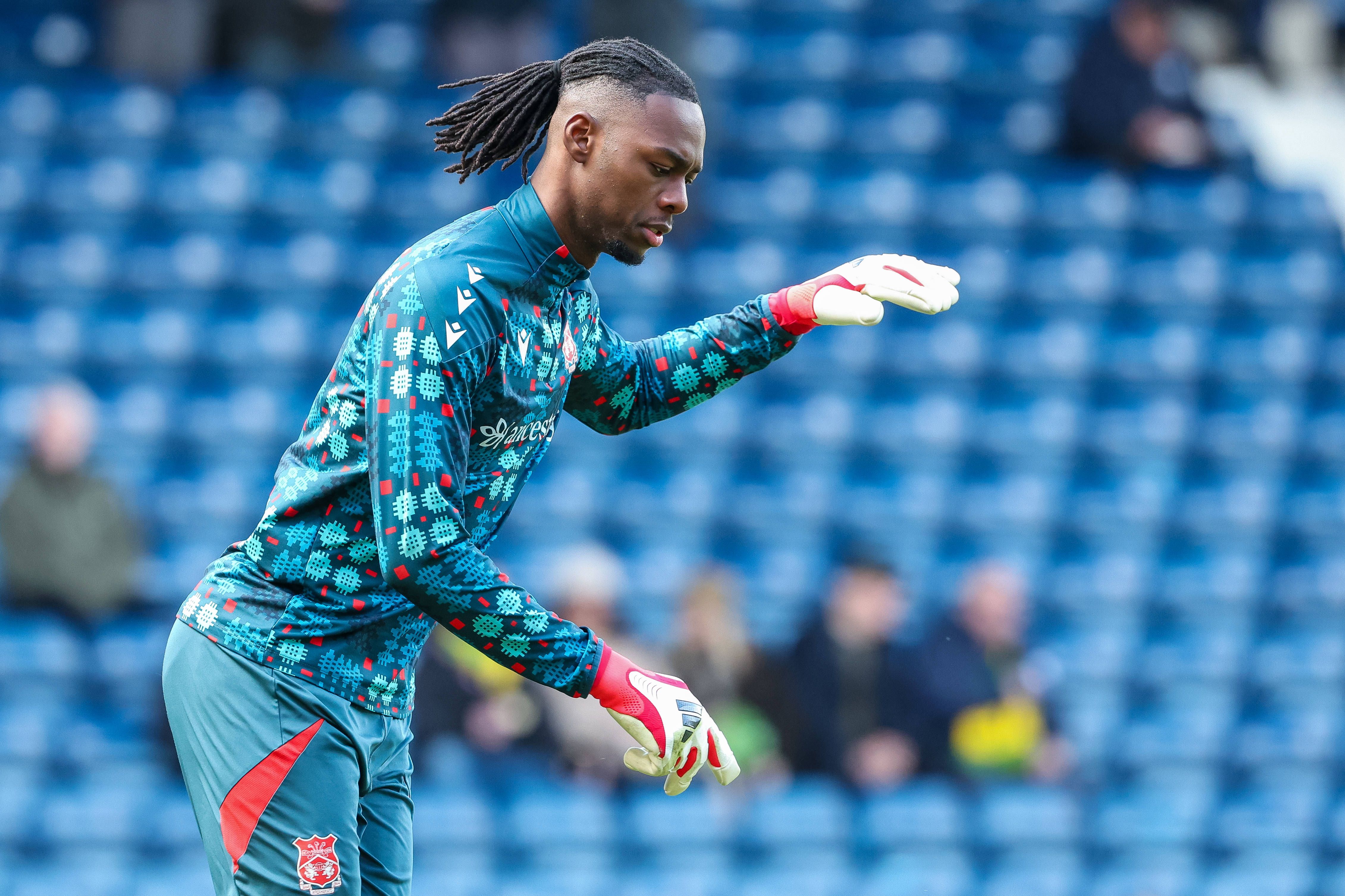 Wrexham AFC goalkeeper Arthur Okonkwo warms up during the Sky Bet Championship match between West Bromwich Albion and Wrexham at The Hawthorns, West Bromwich, on April 3, 2026