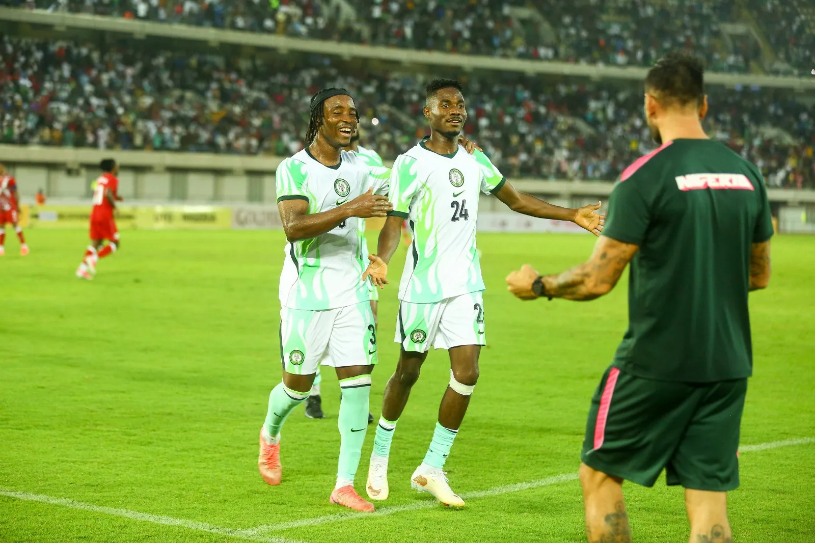 Bruno Onyemaechi and Moses Usor of Super Eagles.