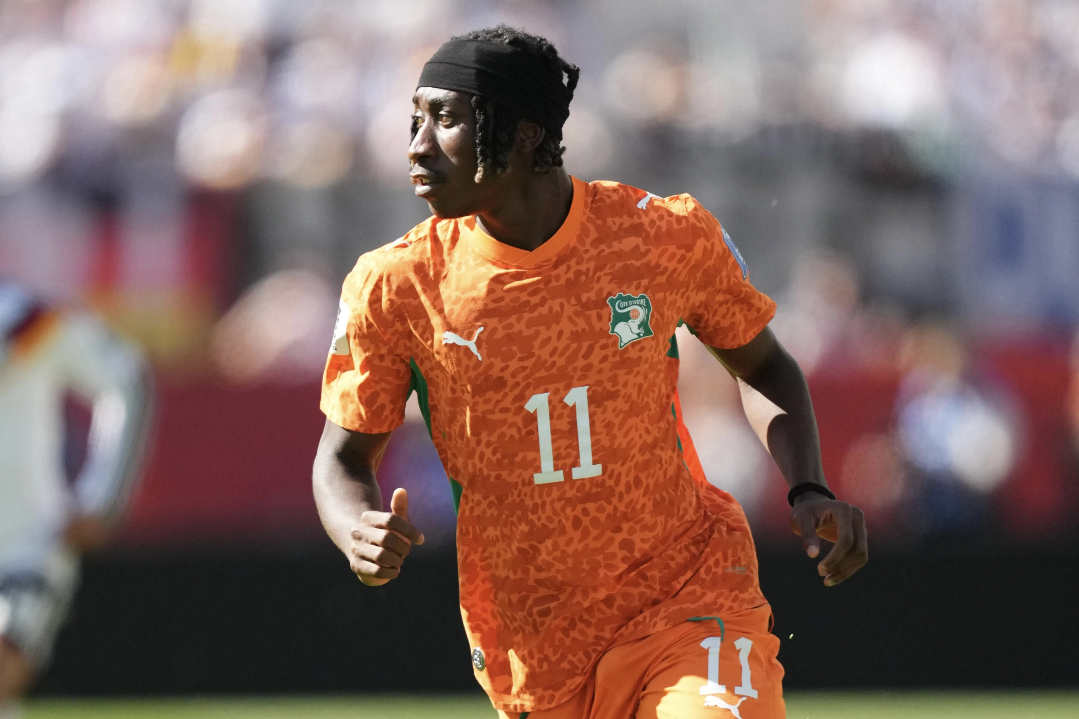 Ivory Coast winger Yan Diomande looks on