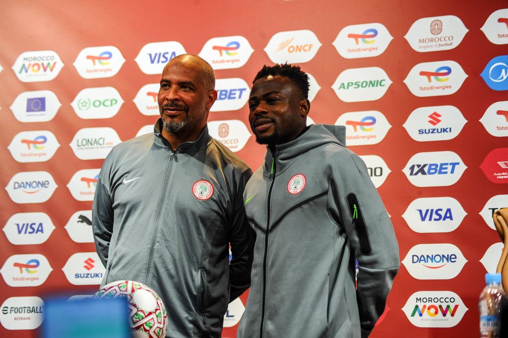 Super Eagles boss Eric Chelle and Moses Simon