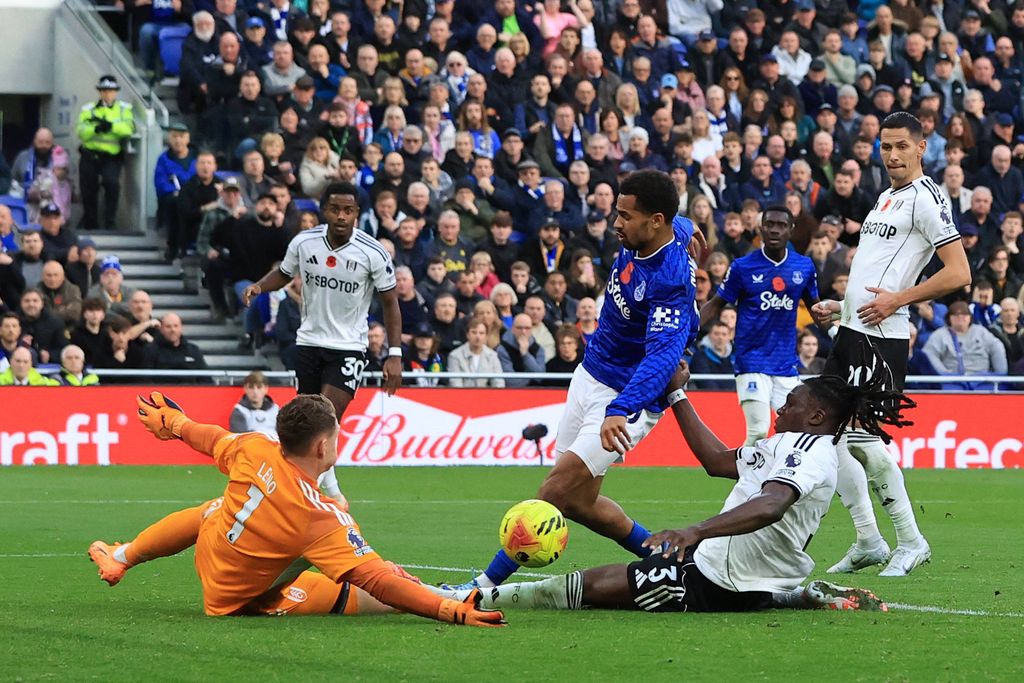 Bernd Leno and Calvin Bassey block a shot from Iliman Ndiaye