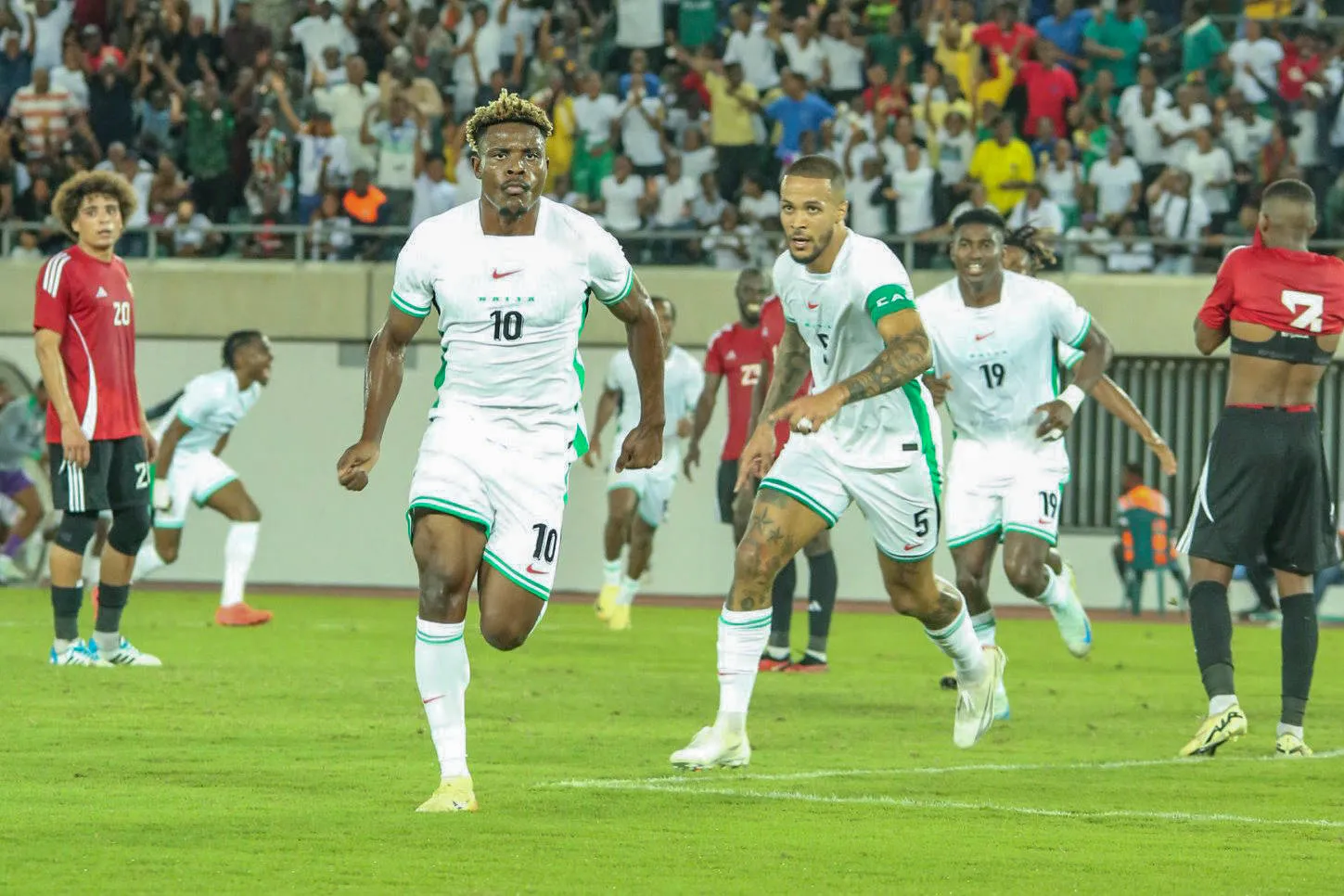 William Ekong, Fisayo Dele Bashiru of Nigeria of Nigeria during the 2025 Africa Cup of Nations AFCON qualifier match between Nigeria and Libya at Godwill Akpabio Stadium