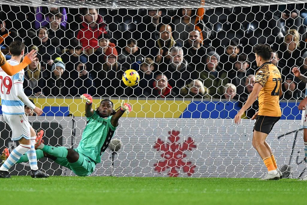 Arthur Okonkwo makes save Hull City forward Kyle Joseph 22 then scores to go 1-0 during the EFL Sky Bet Championship match between Hull City and Wrexham