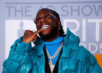 Star boys link-up: Chelsea Legend Didier Drogba poses shot with Afrobeats stars Wizkid and Burna Boy