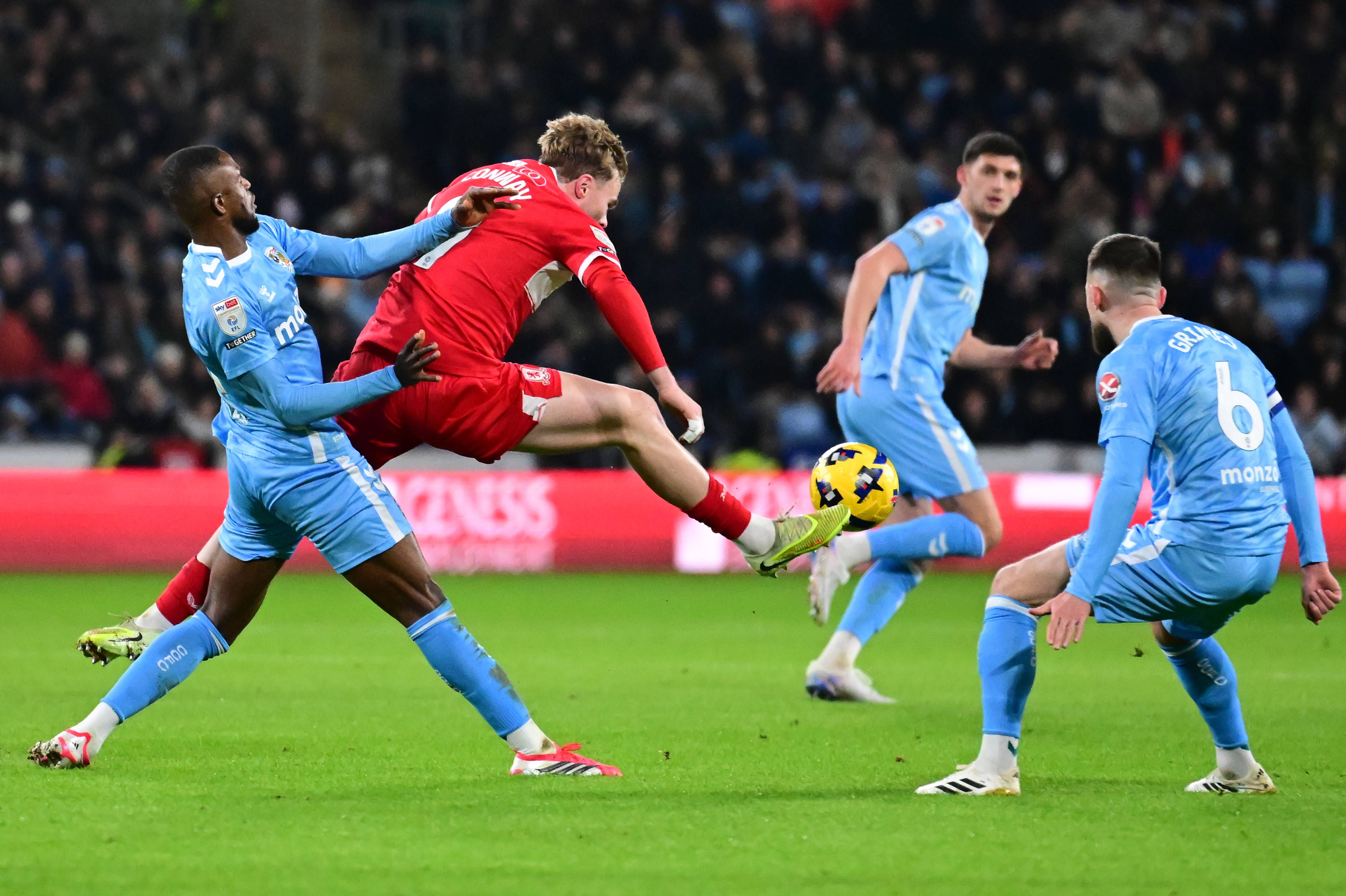 Frank Onyeka battles for possession with Tommy Conway during the EFL Sky Bet Championship match between Coventry City and Middlesbrough