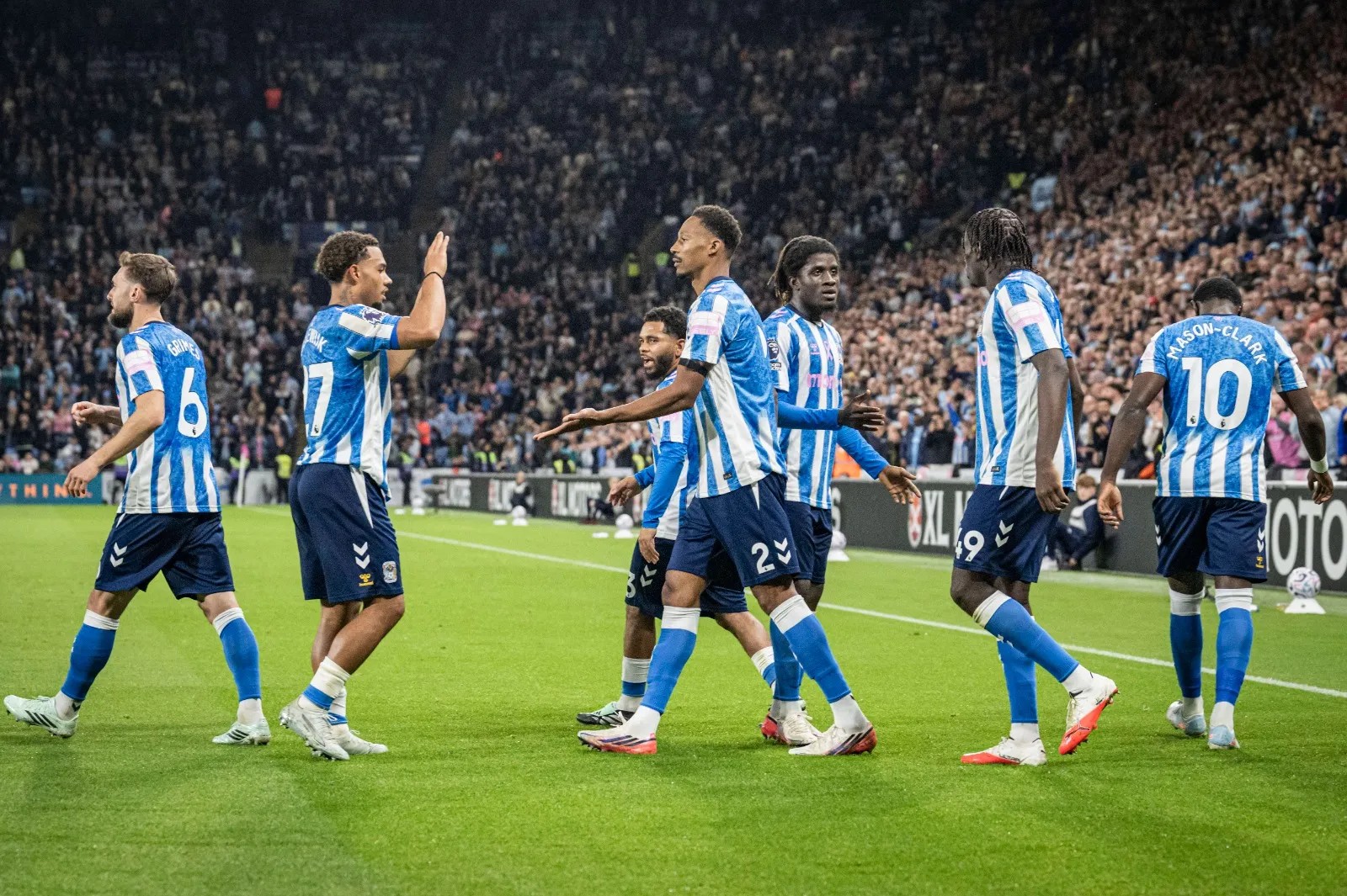 Coventry City players celebrate goal