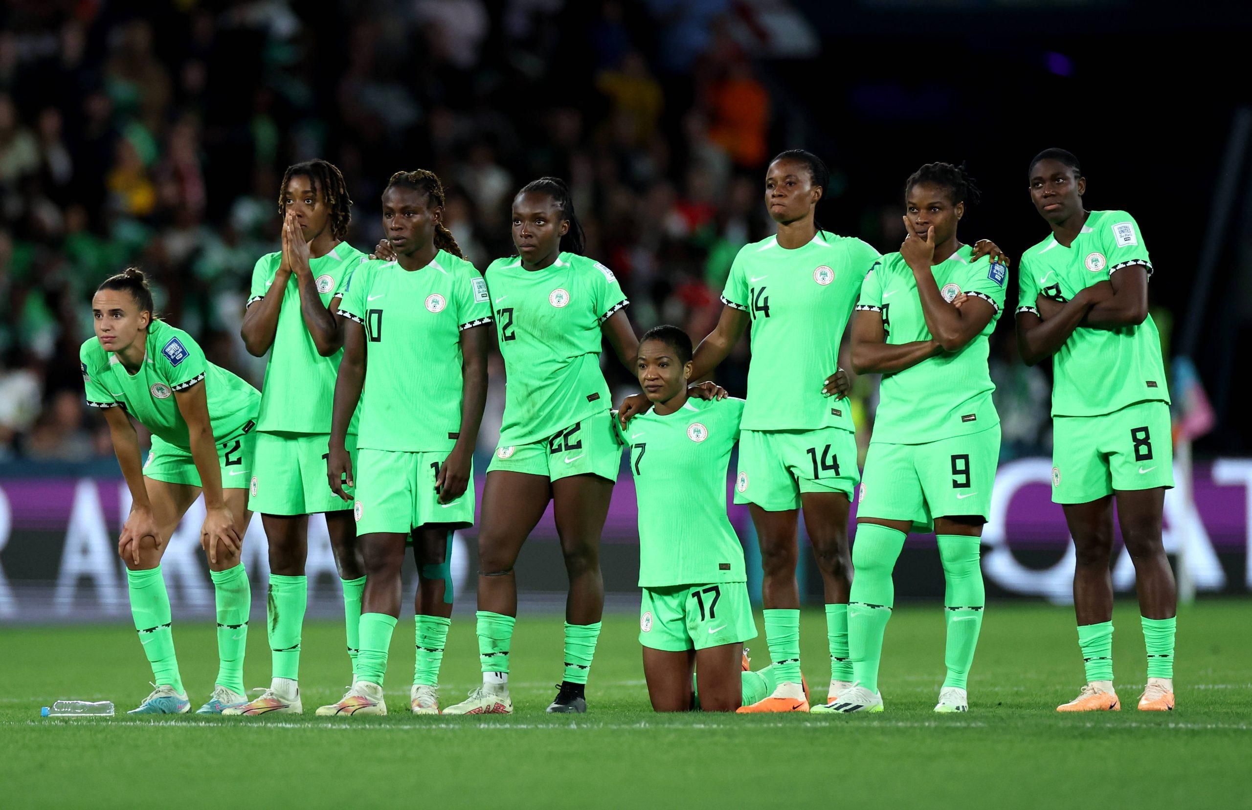 Super Falcons of Nigeria players and Michelle Alozie