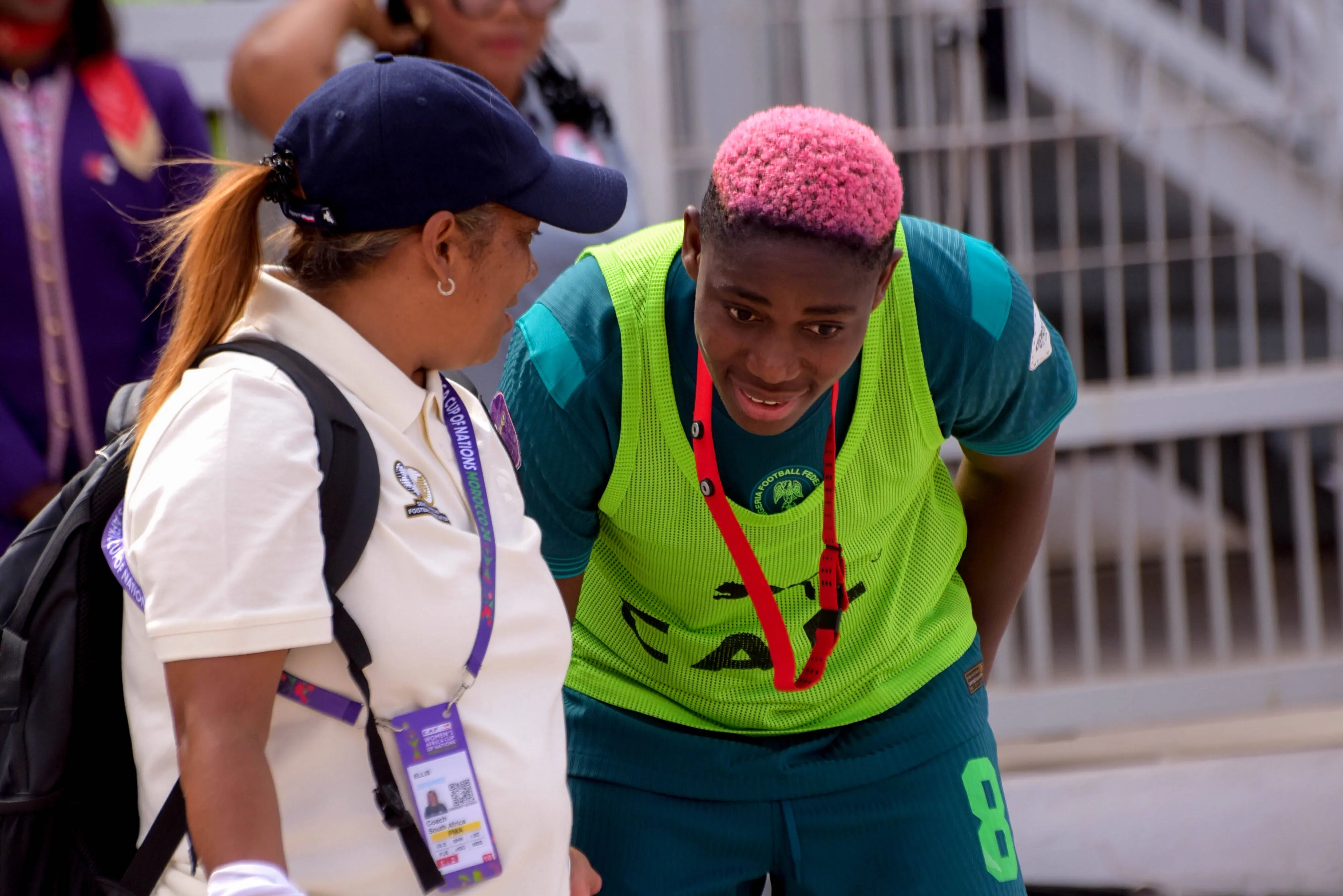 Coach Desiree Ellis of South Africa and Asisat Oshoala
