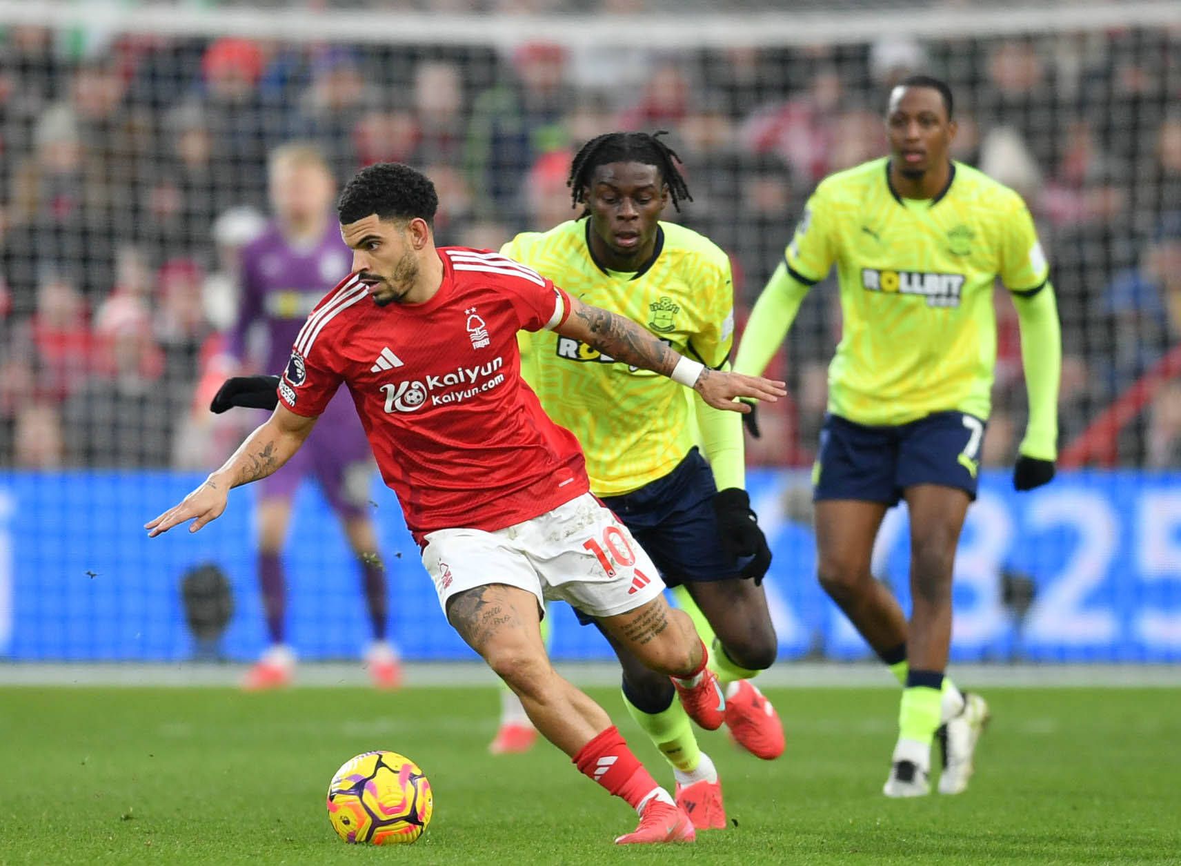 Morgan Gibbs-White in possession whilst under pressure from Lesley Ugochukwu